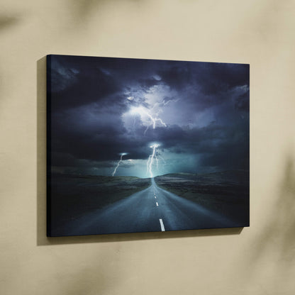 Dark canvas print of stormy road with multiple lightning strikes under dark blue sky for cinematic wall decor