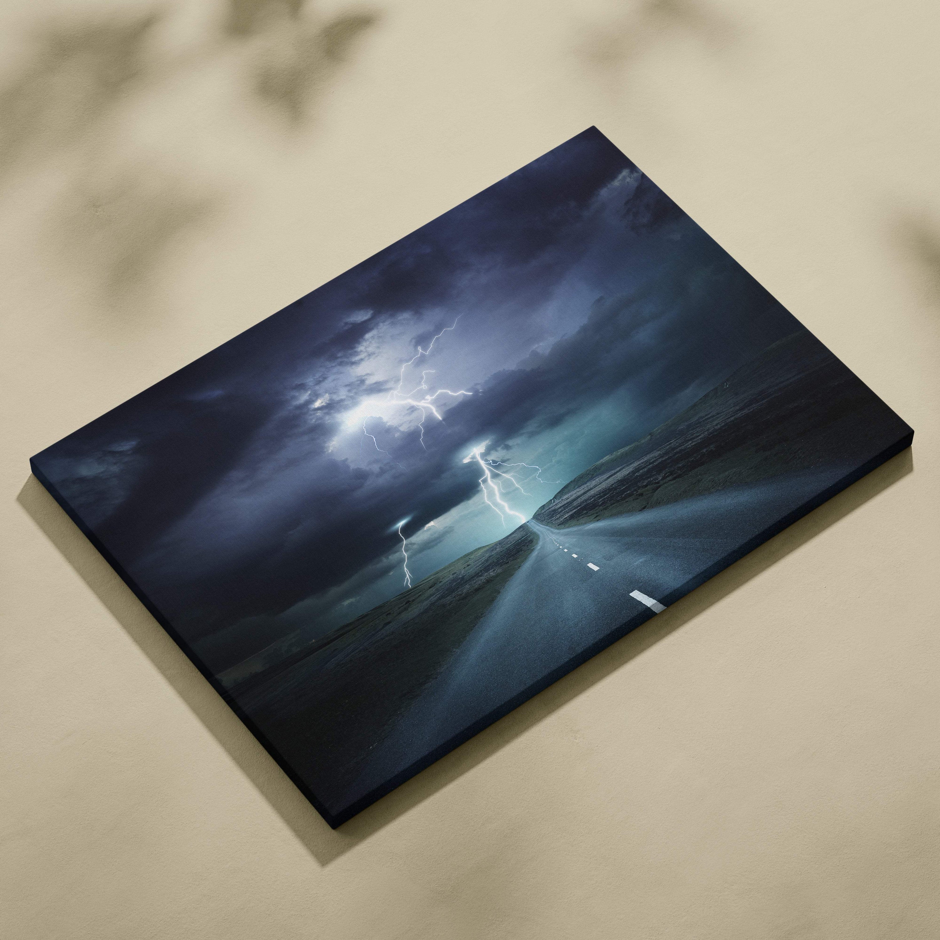 Dark blue canvas print of dramatic lightning storm over empty road cinematic landscape wall decor