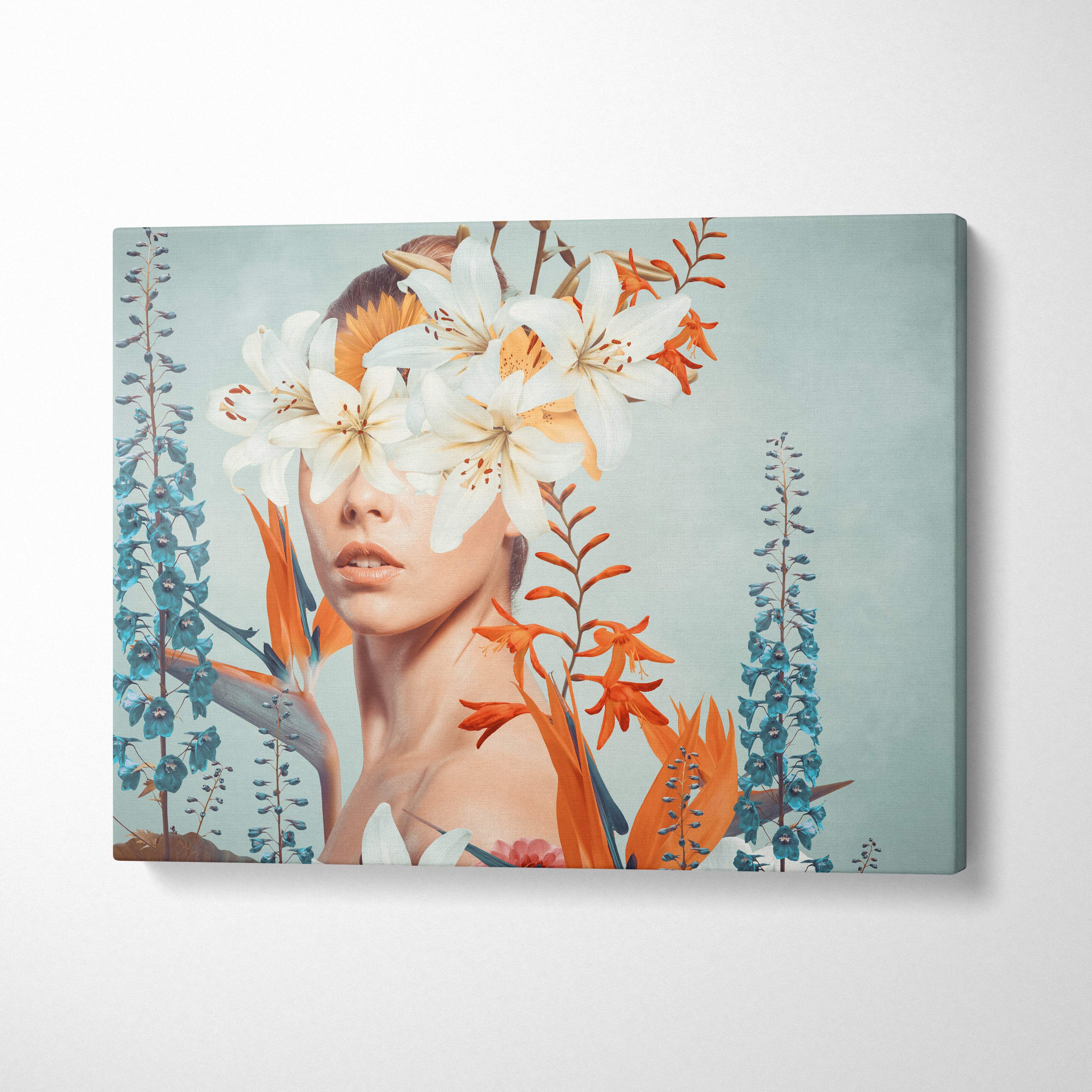 Rectangular canvas print of a woman with white and orange lilies over eyes surrounded by blue and orange floral elements