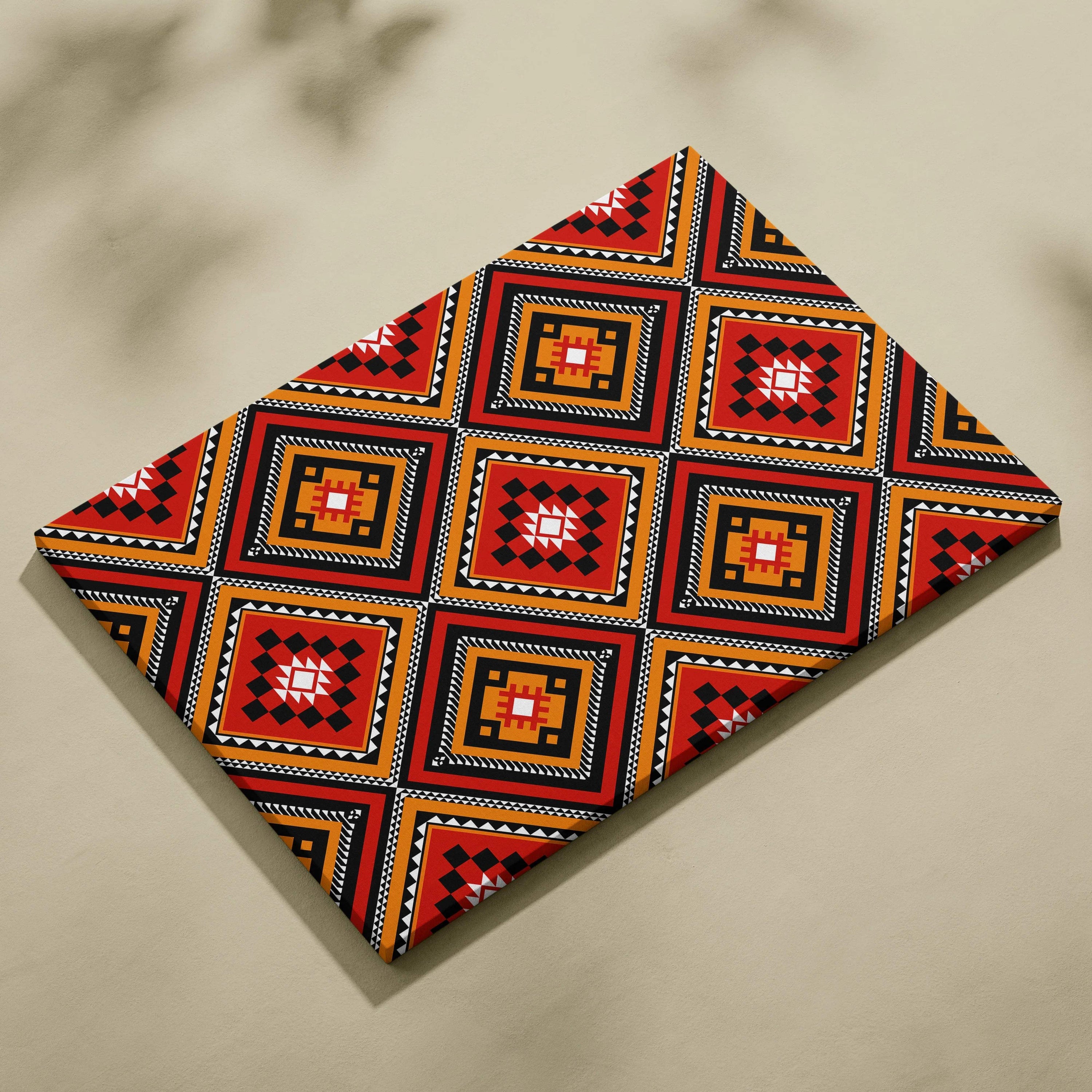 Tribal diamond pattern canvas wall art in red, orange, black, white geometric motifs