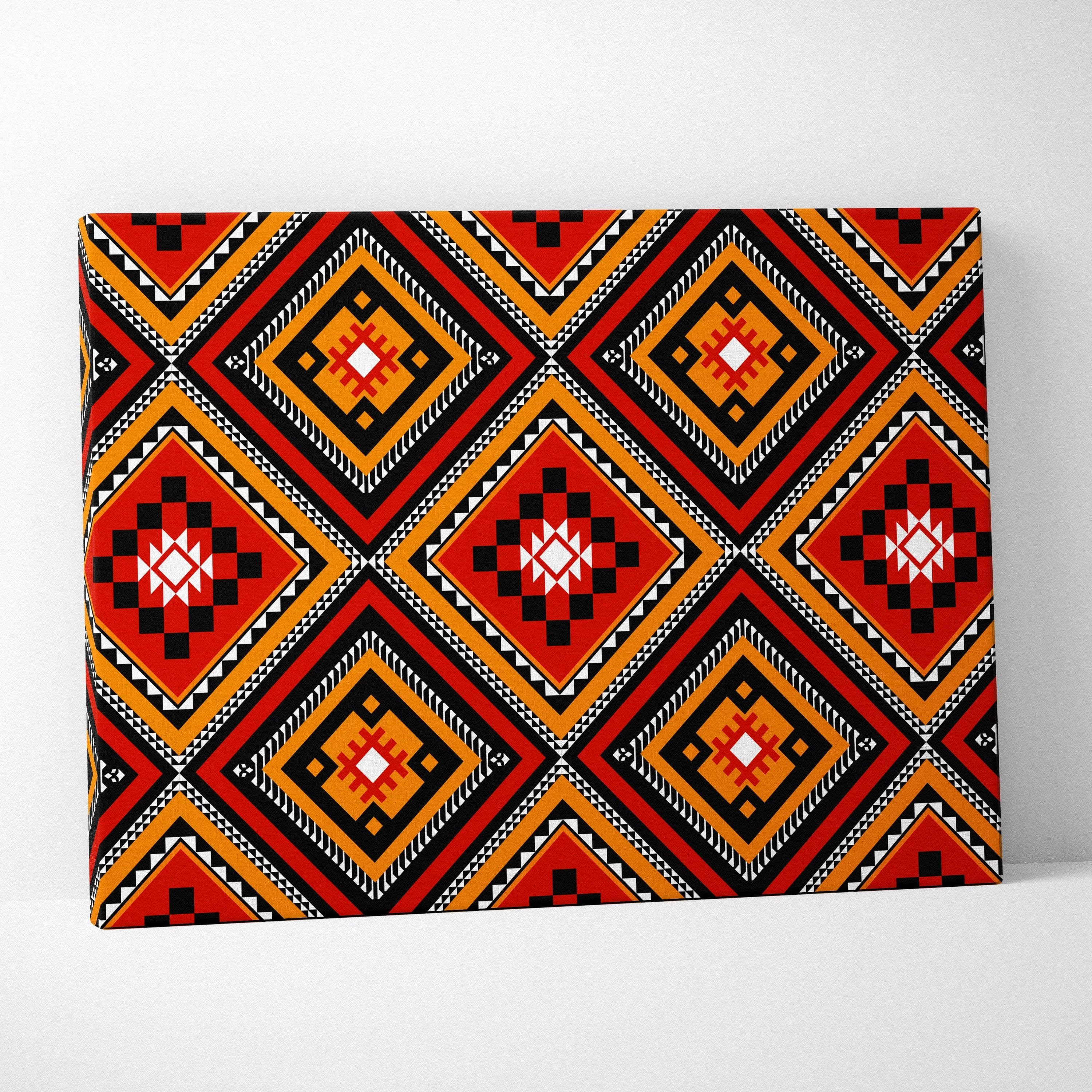 Tribal diamond pattern canvas wall art in bold red orange black white geometric motifs