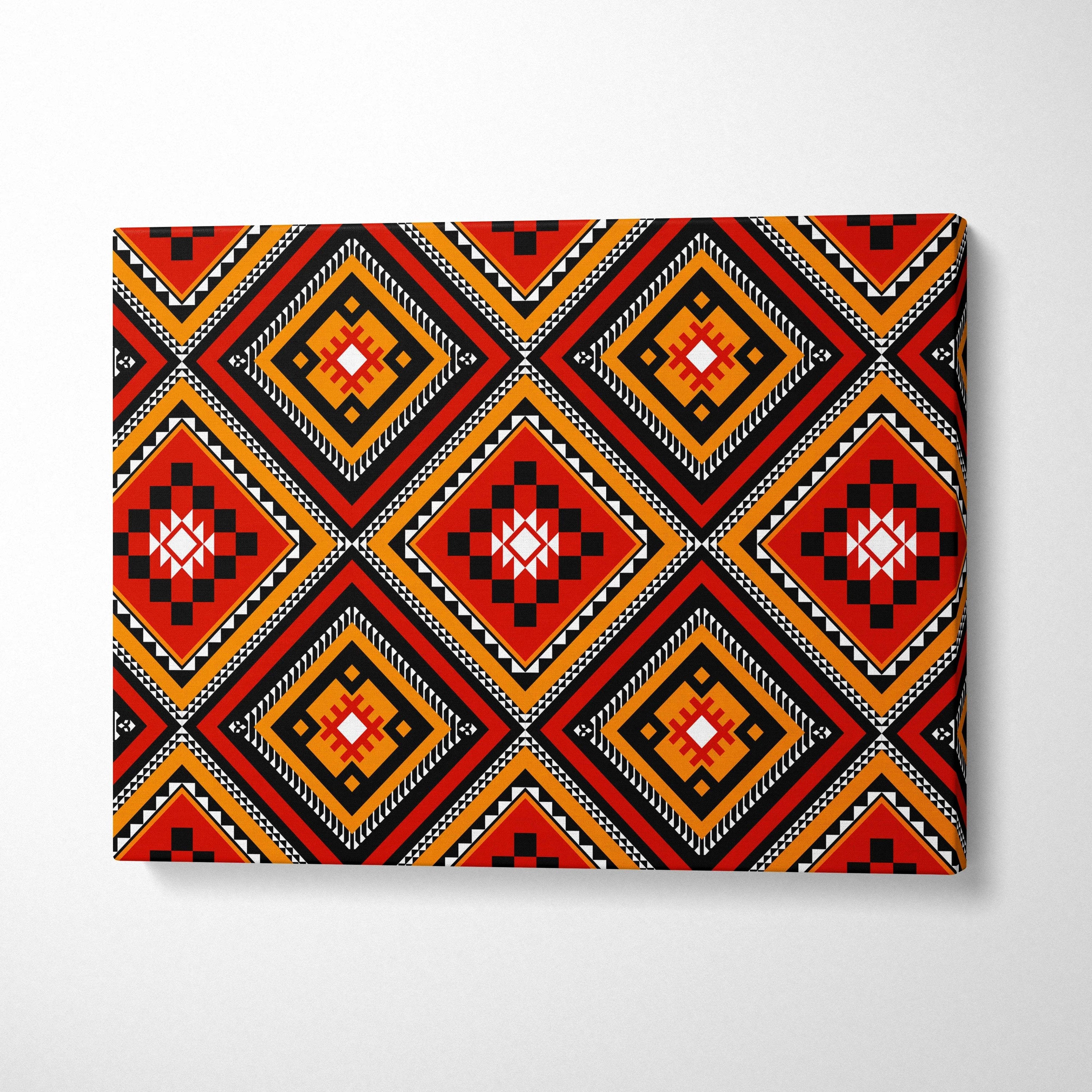 Tribal diamond pattern canvas wall art in bold red orange black white geometric motifs