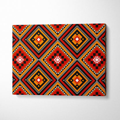 Tribal diamond pattern canvas wall art in bold red orange black white geometric motifs