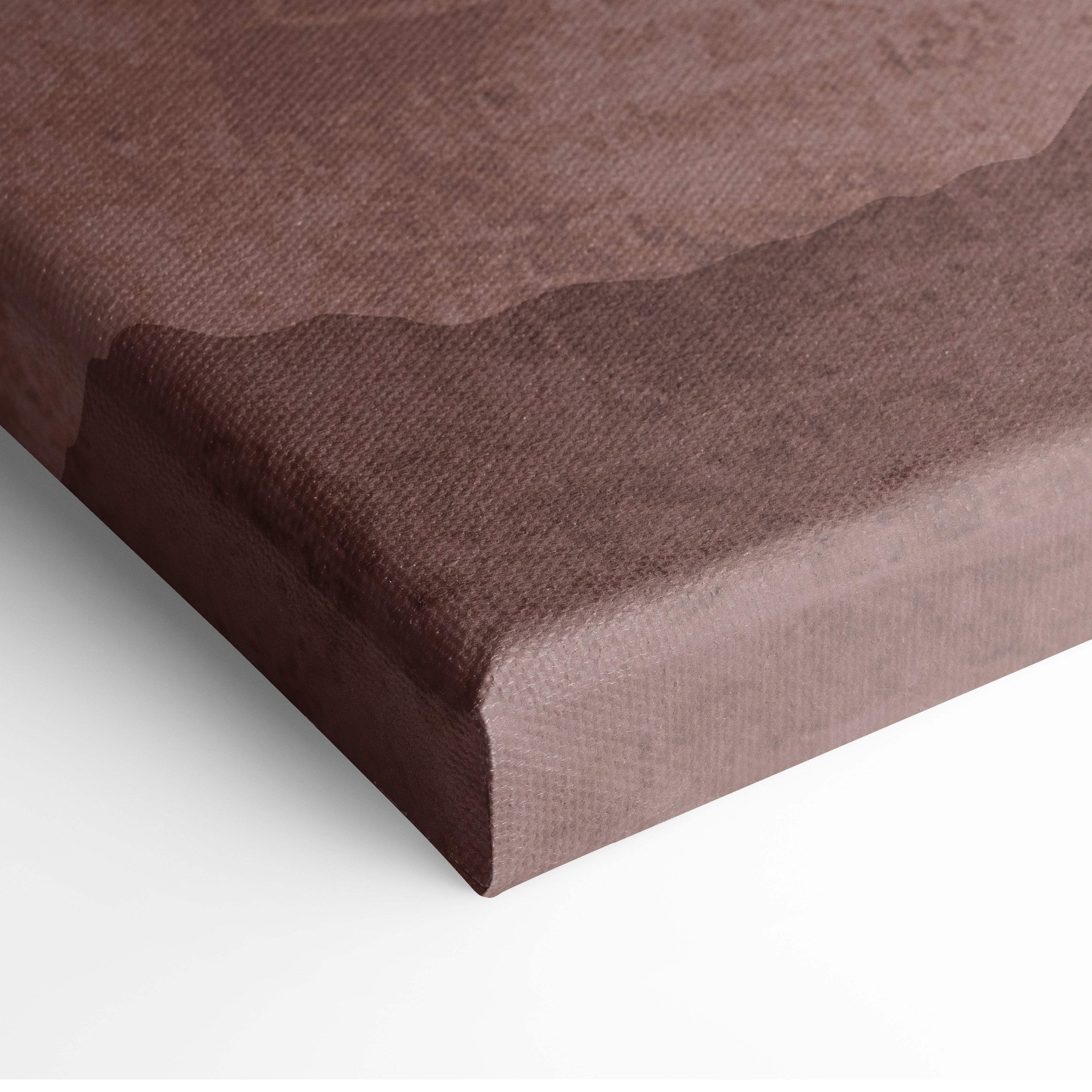 Boho desert mountain canvas art with warm earth tones textured brown fabric surface and visible weave pattern