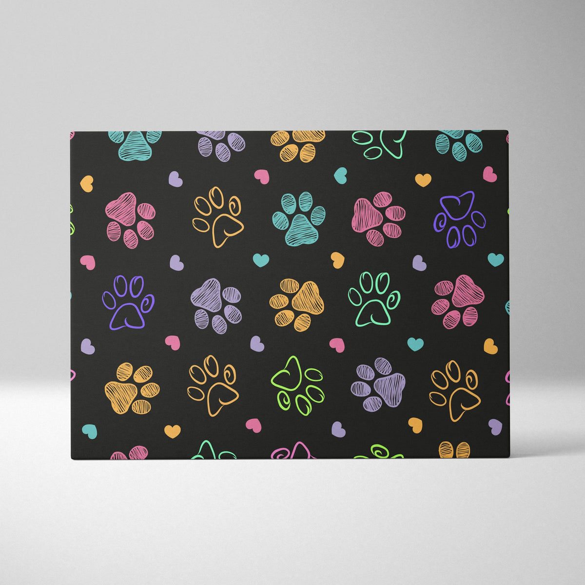 Black mat with colorful paw prints, hearts in Nordic folk art style