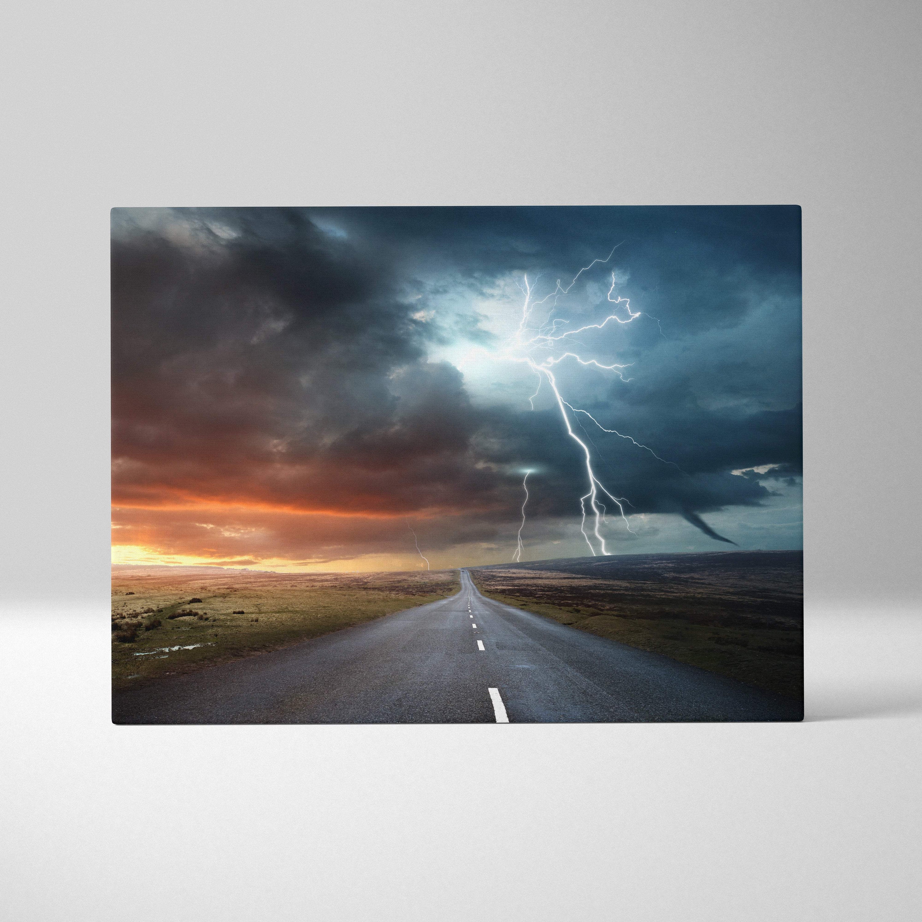 Canvas art of a dramatic blue thunder sky with fiery sunset horizon and lightning bolts over an empty road at dusk