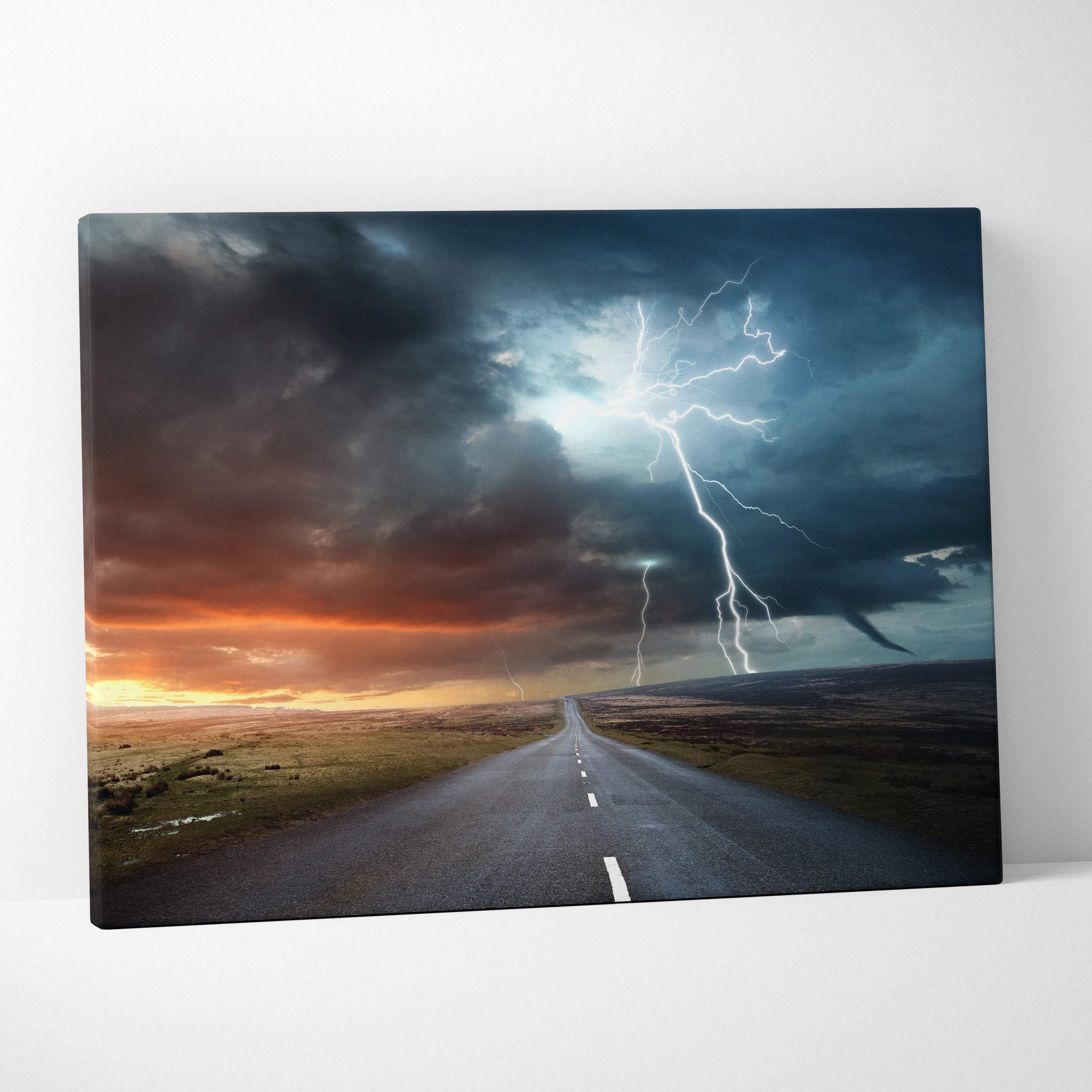 Stormy sky canvas print with dramatic blue lightning bolts over a long road at fiery sunset horizon wall decor