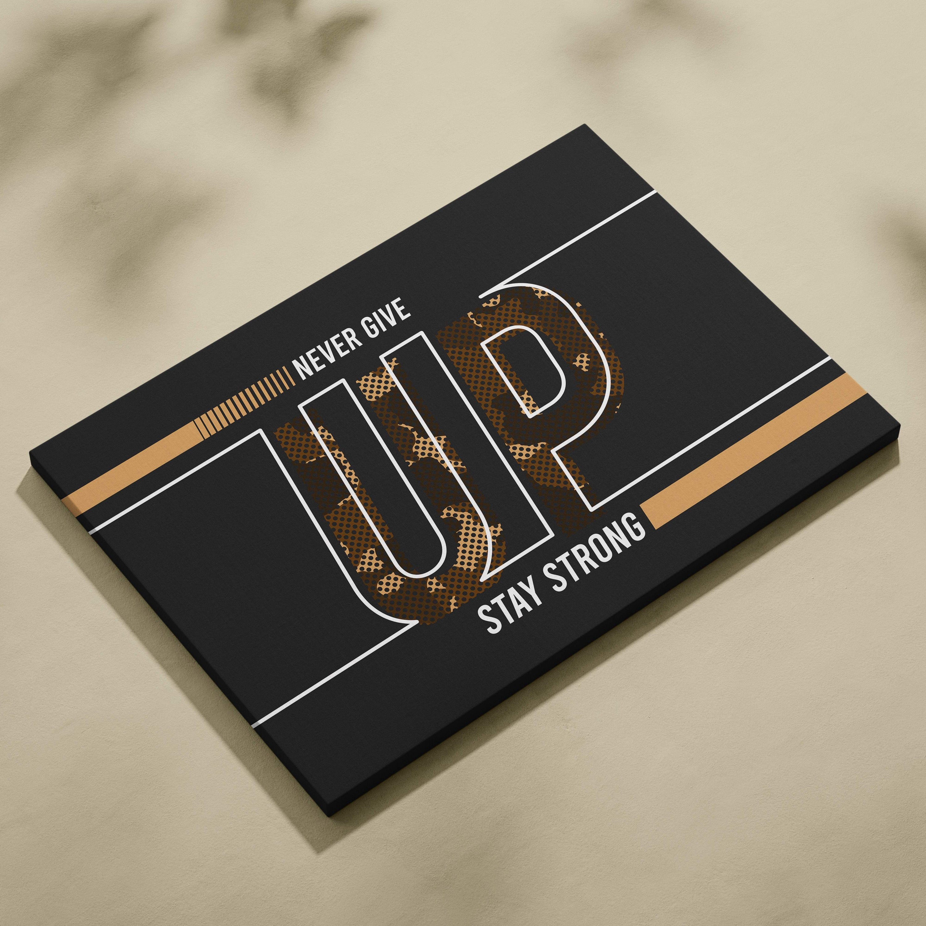 Black canvas print with bold white lettering filled with gold texture and tan stripes motivational wall art for gym or office