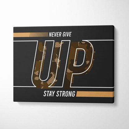 Motivational never give up canvas wall art with bold white outlined gold camouflage letters on black for gym office or bedroom