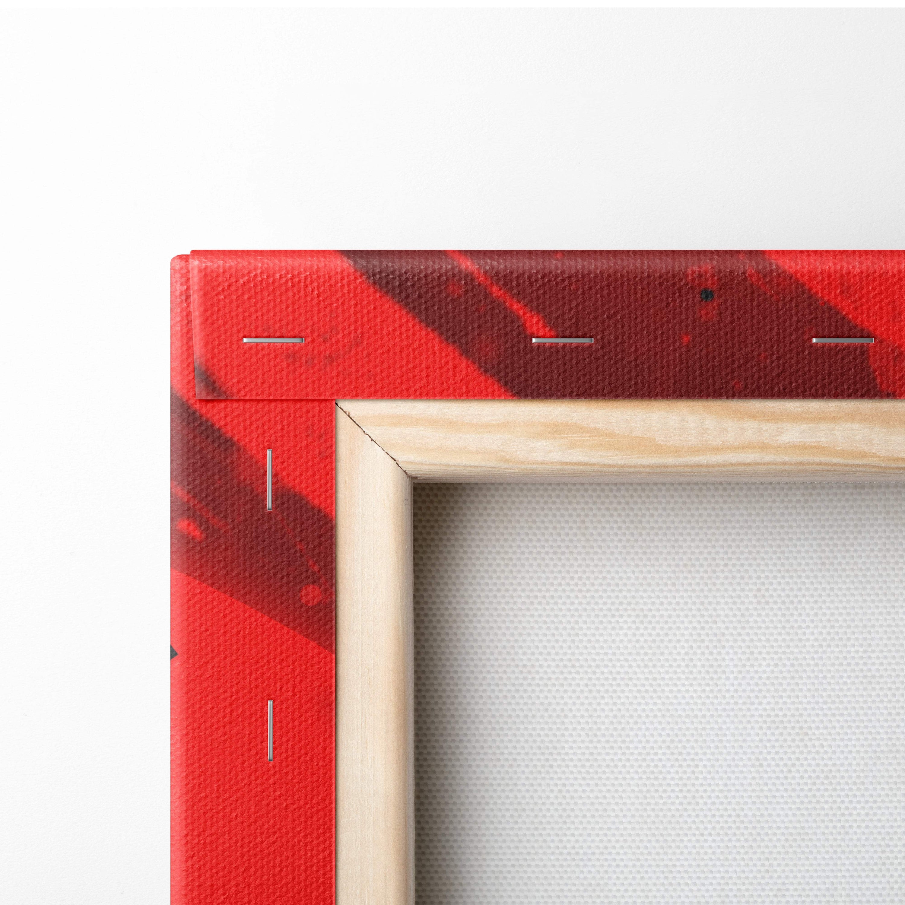 Red samurai silhouette canvas wall art with a bold black warrior and katana on red abstract background in light wood frame