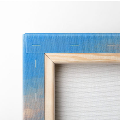 Contemporary cloud ladder canvas wall art featuring a blue sky dreamscape print on blue canvas with wooden frame