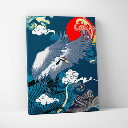 A rectangular canvas print of a white crane with gray wings and red head under a red sun on deep blue background