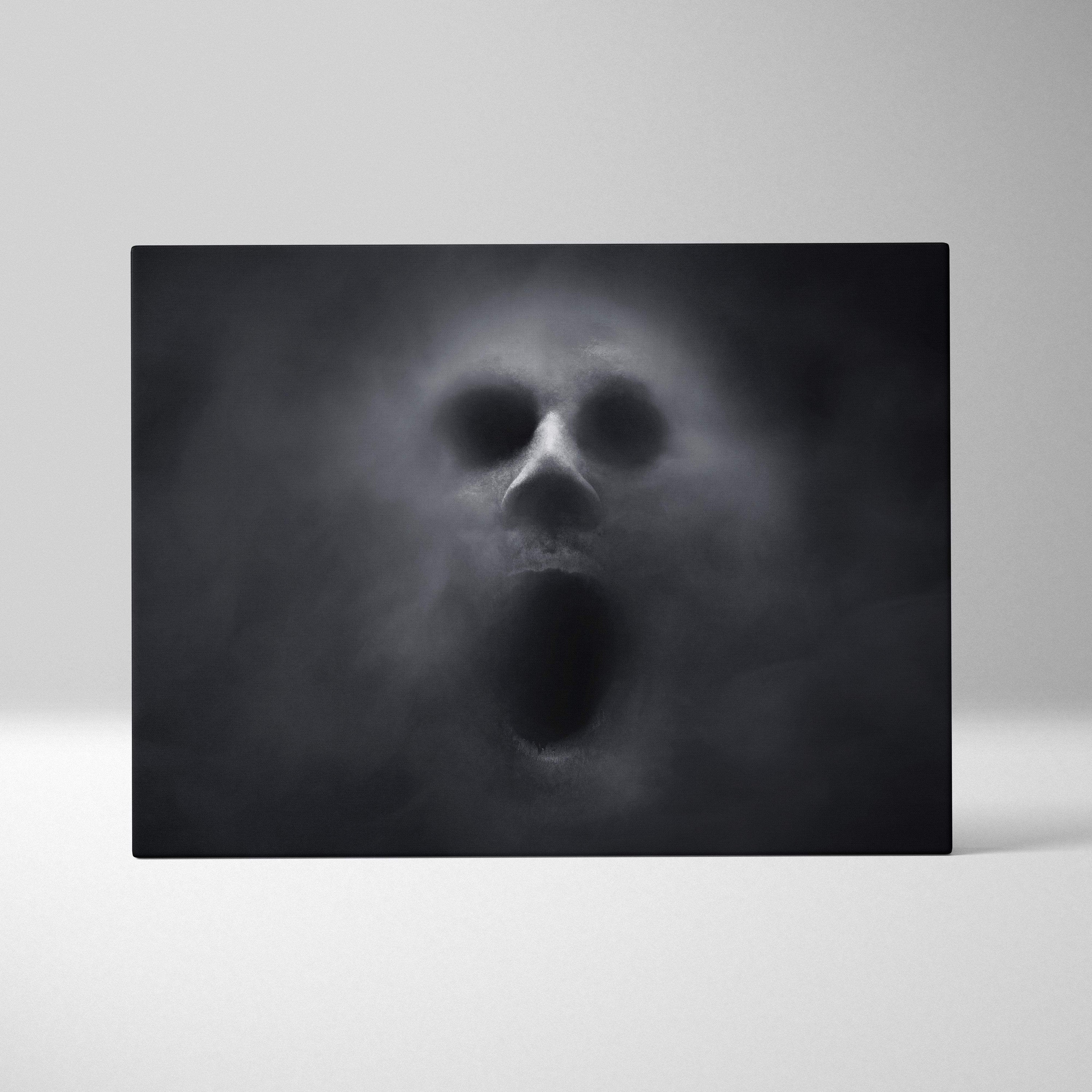 Black ghost skull canvas print of a foggy ghostly face with open mouth in black and white moody gothic style wall art
