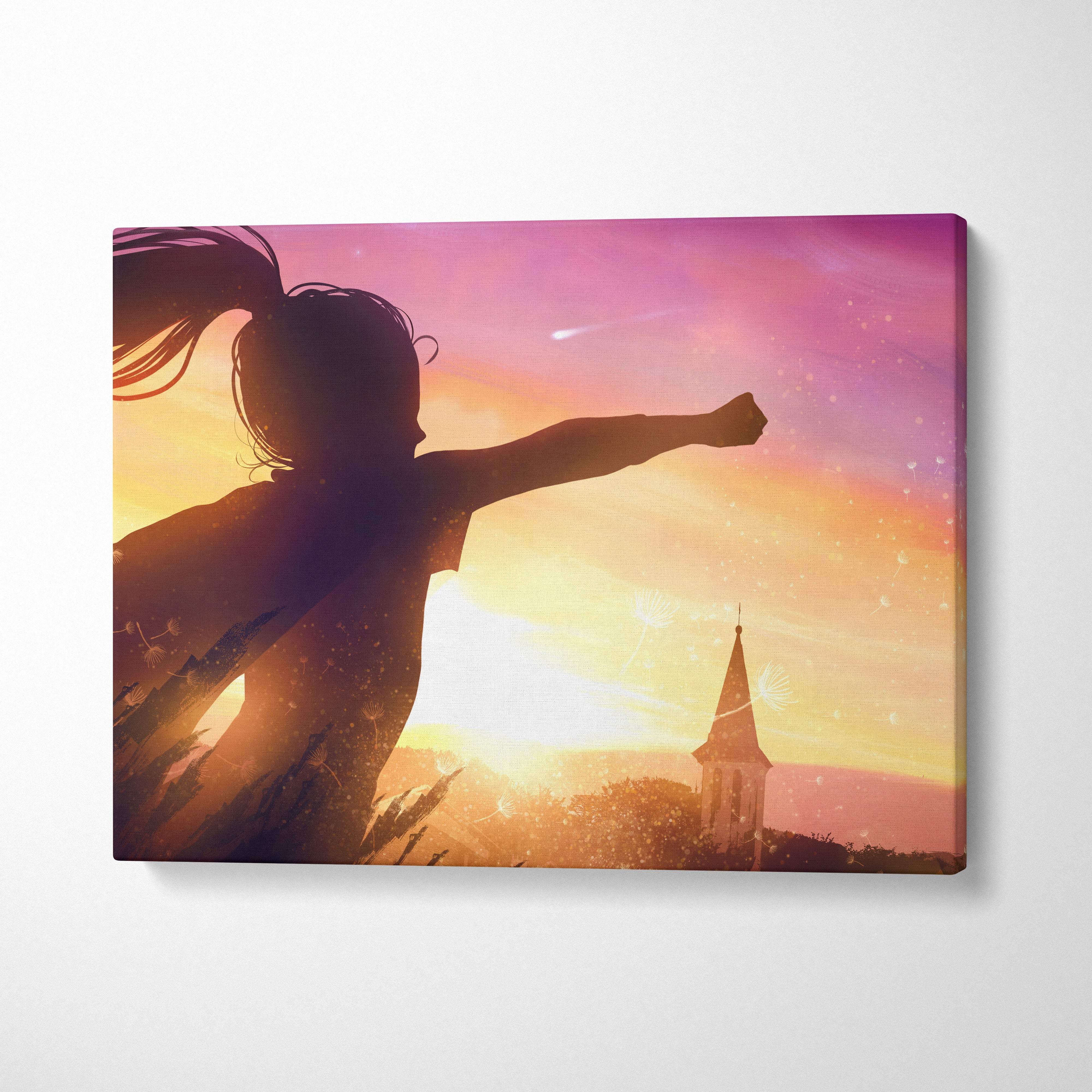 A vibrant canvas print of a girl silhouette in flight against a golden pink sunset sky above a church steeple