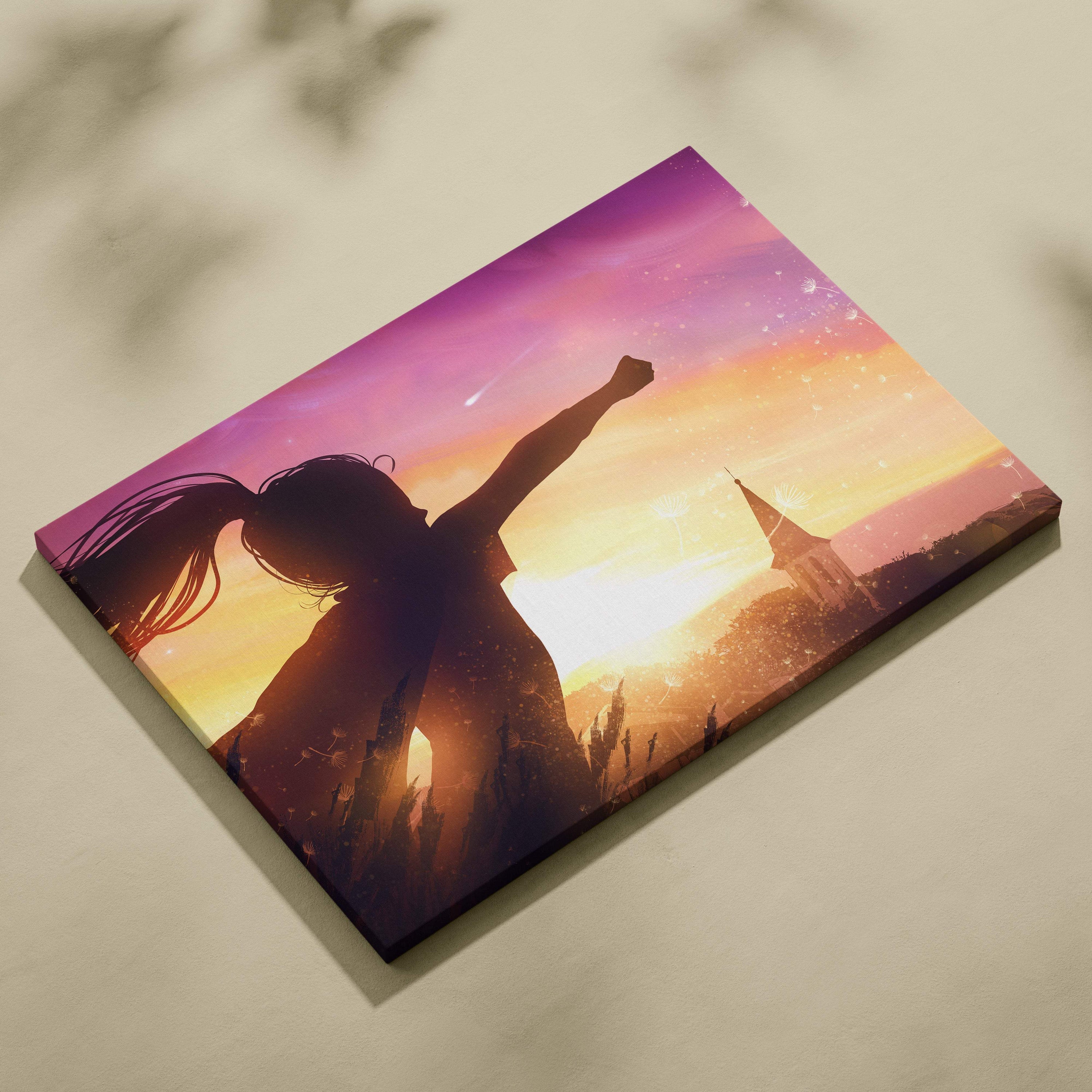 Vibrant canvas wall art featuring a silhouette of a woman with raised arm against a golden pink sunset sky
