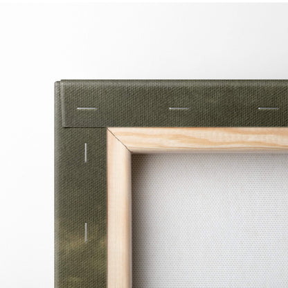 Olive green canvas wrapped around light wood frame with stitching for dark fantasy skull fortress wall art display