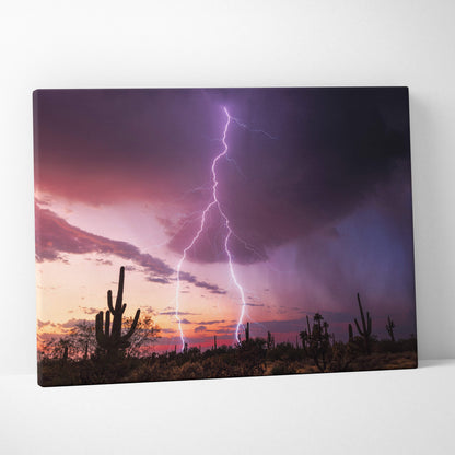 Canvas print featuring a dramatic lightning strike over a desert cactus landscape with purple sunset sky wall decor