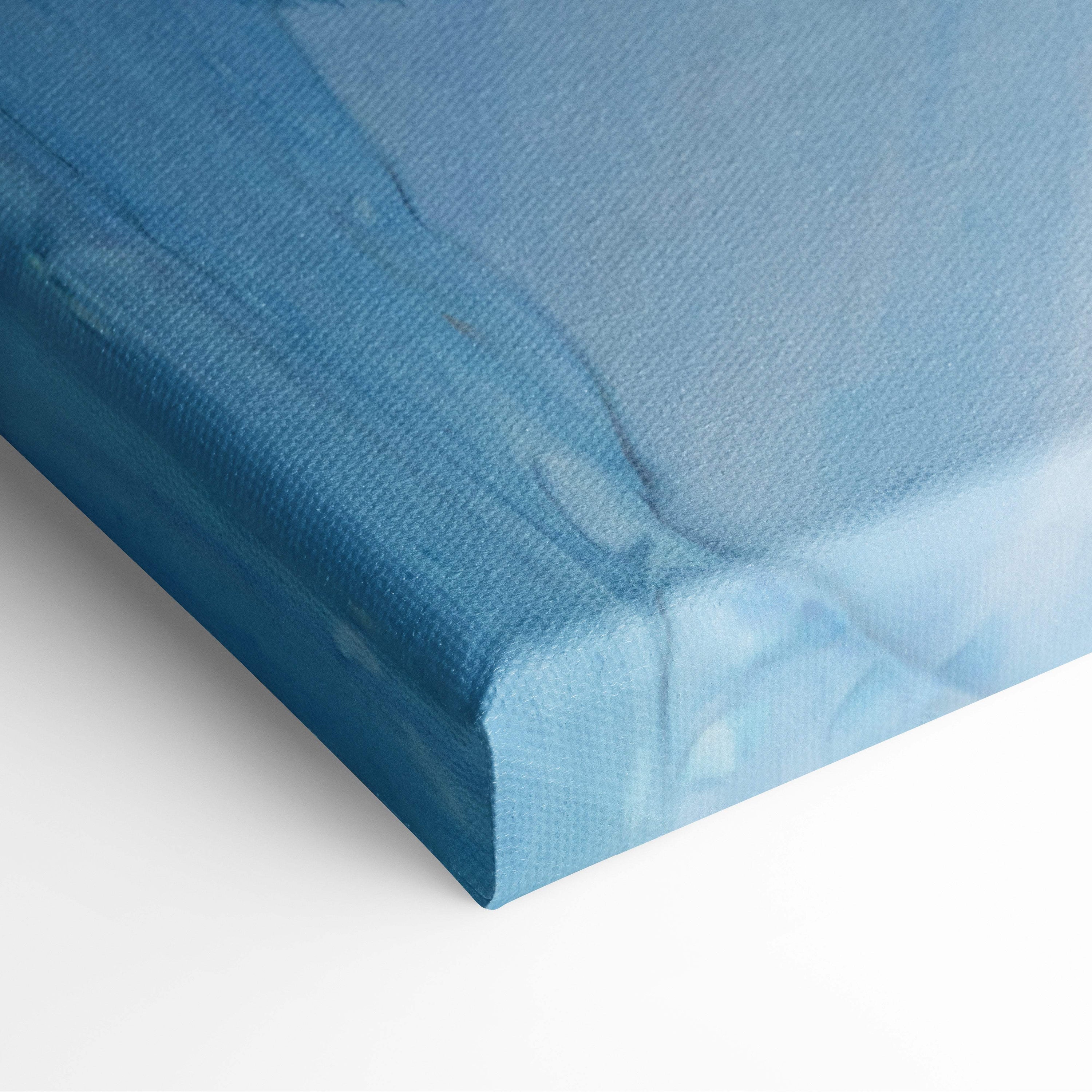 Blue gradient canvas wall art print with textured fabric edges featuring summer hat style for coastal bathroom decor
