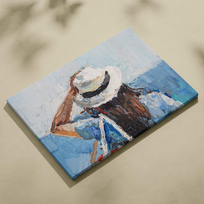 Textured canvas wall art print of a person in a white straw hat with black band wearing blue and brown against blue background