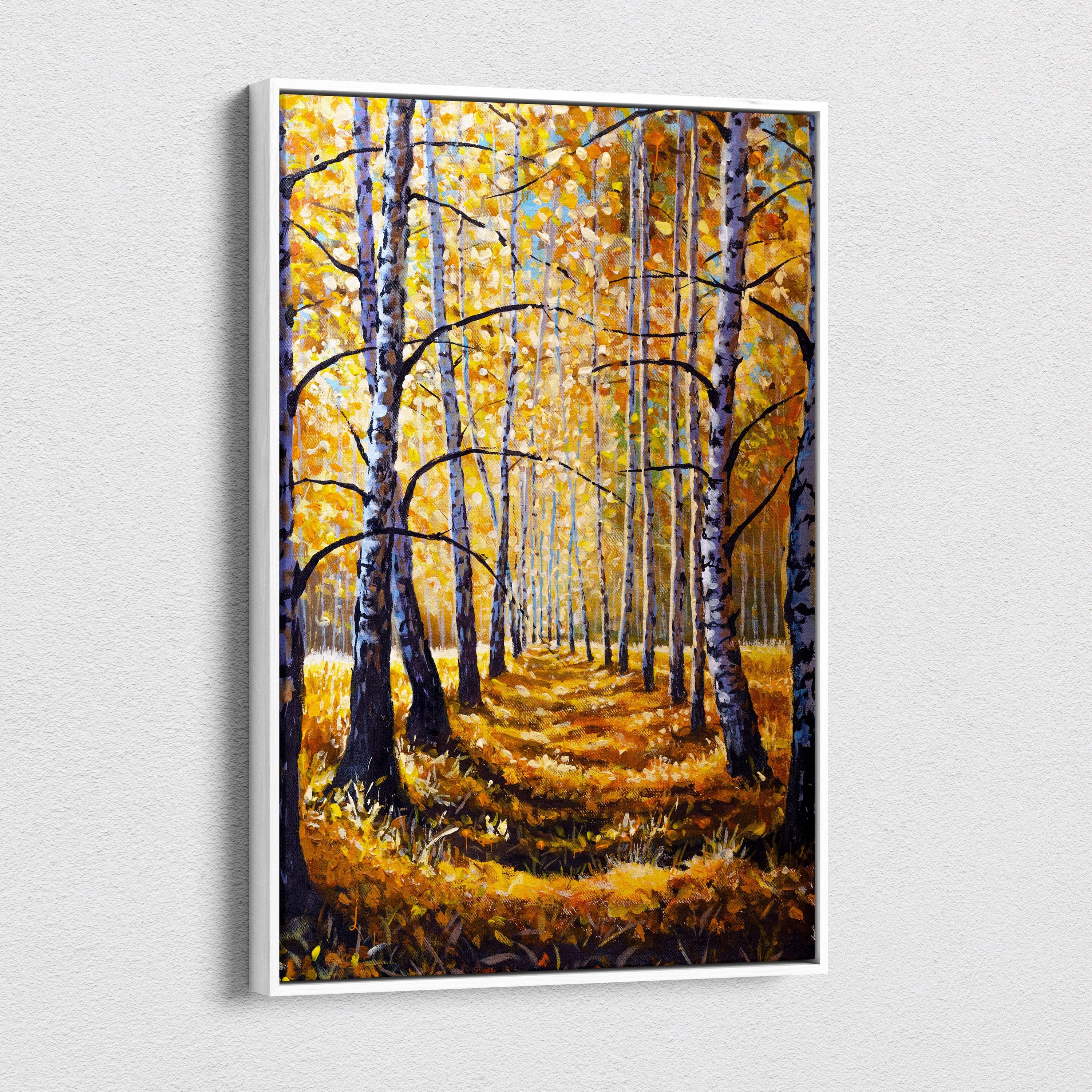 A framed autumn birch forest canvas print featuring white tree trunks and golden yellow leaves under a soft blue sky