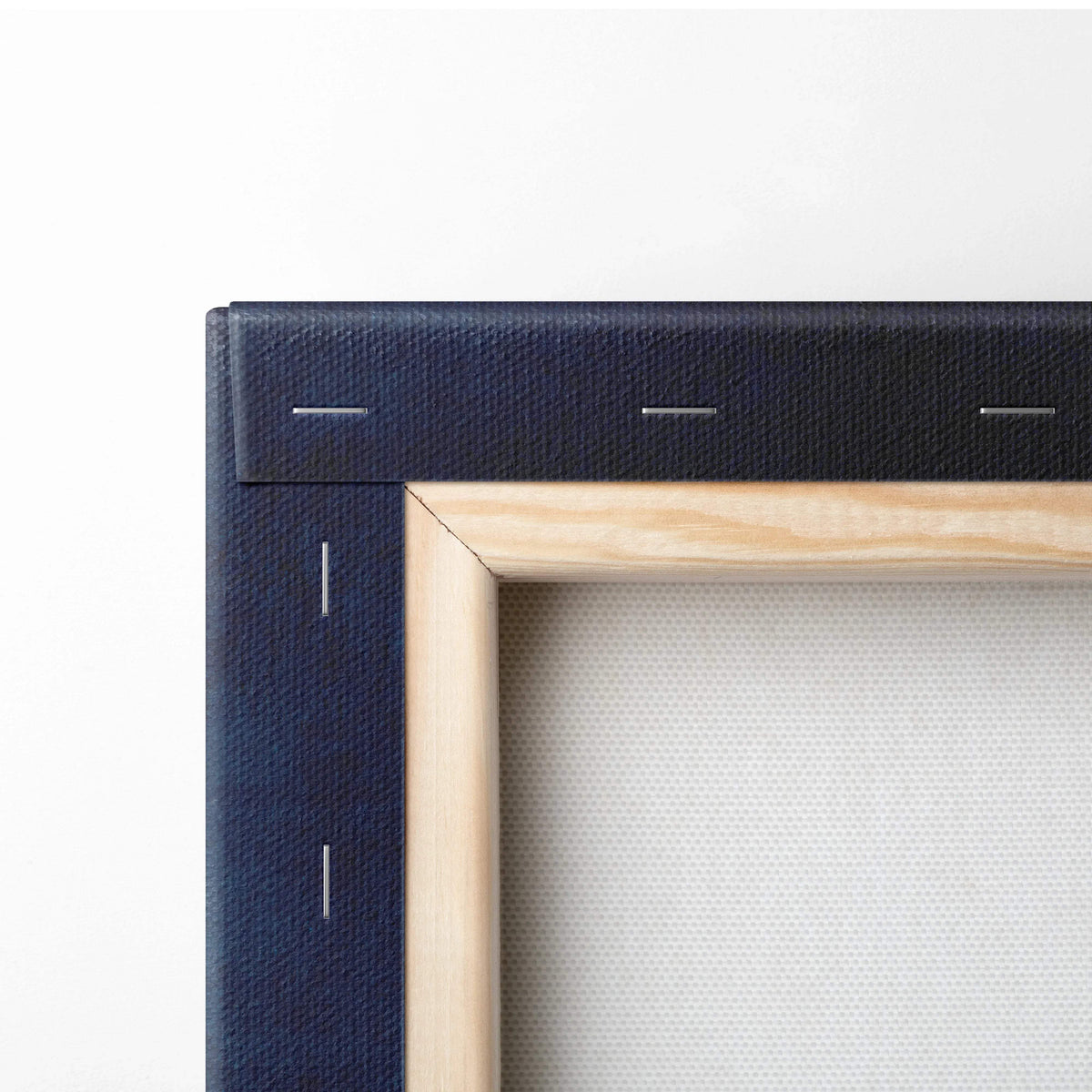 Navy blue textured canvas frame with light wood border minimalist sky art