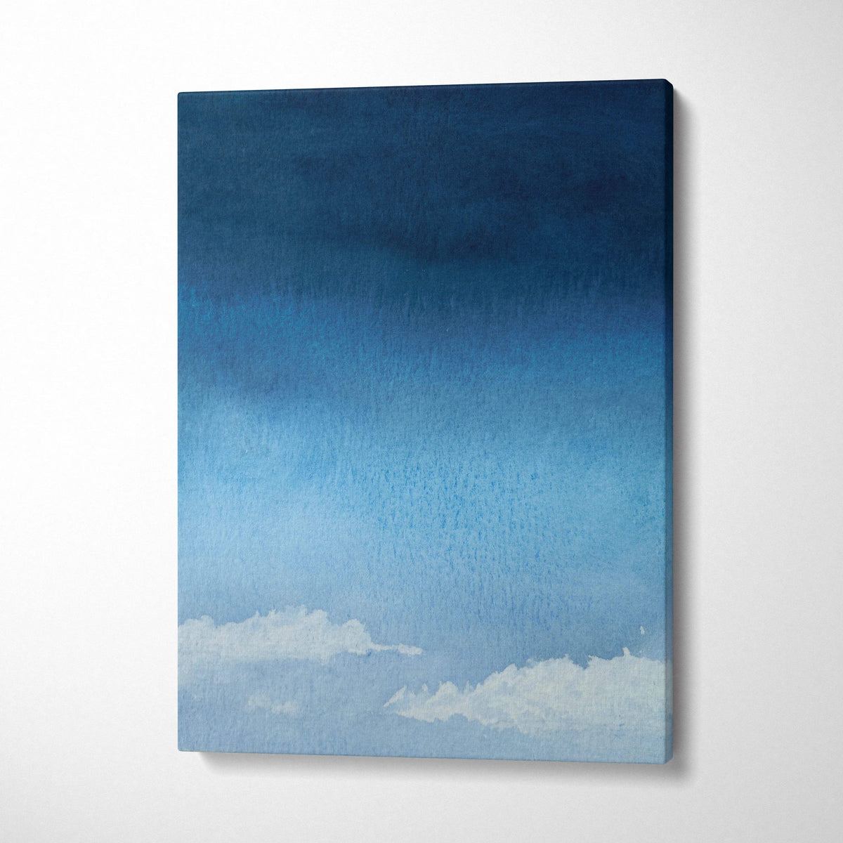 Minimalist watercolor sky canvas art with navy to azure gradient and soft white clouds