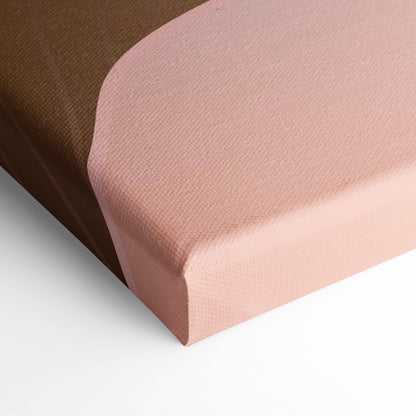 A blush pink canvas wall art with textured surface and brown backing in boho desert sunset style for living room decor