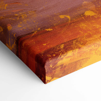 A textured canvas print of golden sunset reading silhouette wall art with warm orange yellow abstract design