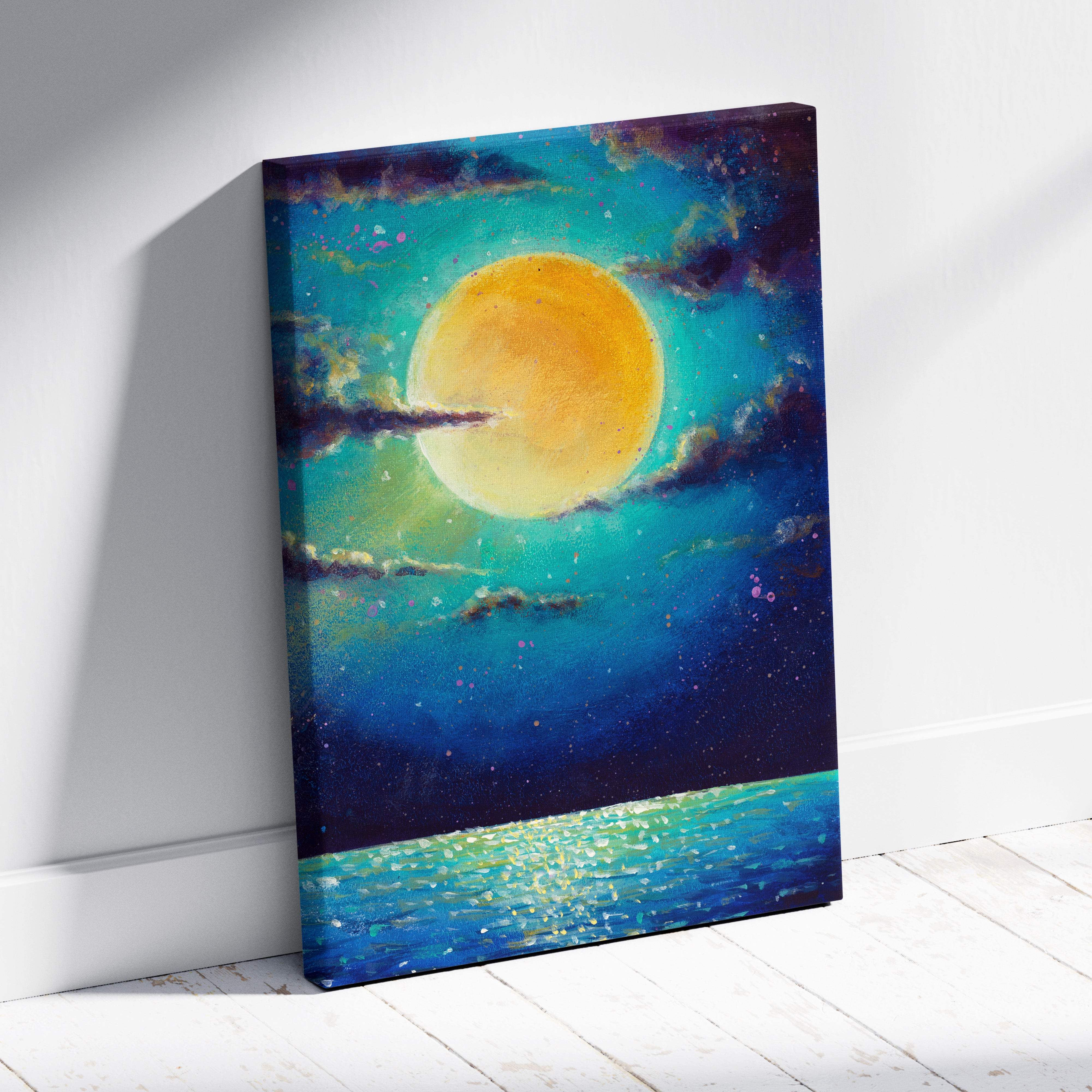 Vibrant canvas print of glowing golden moon over teal and deep blue sky reflecting on turquoise water