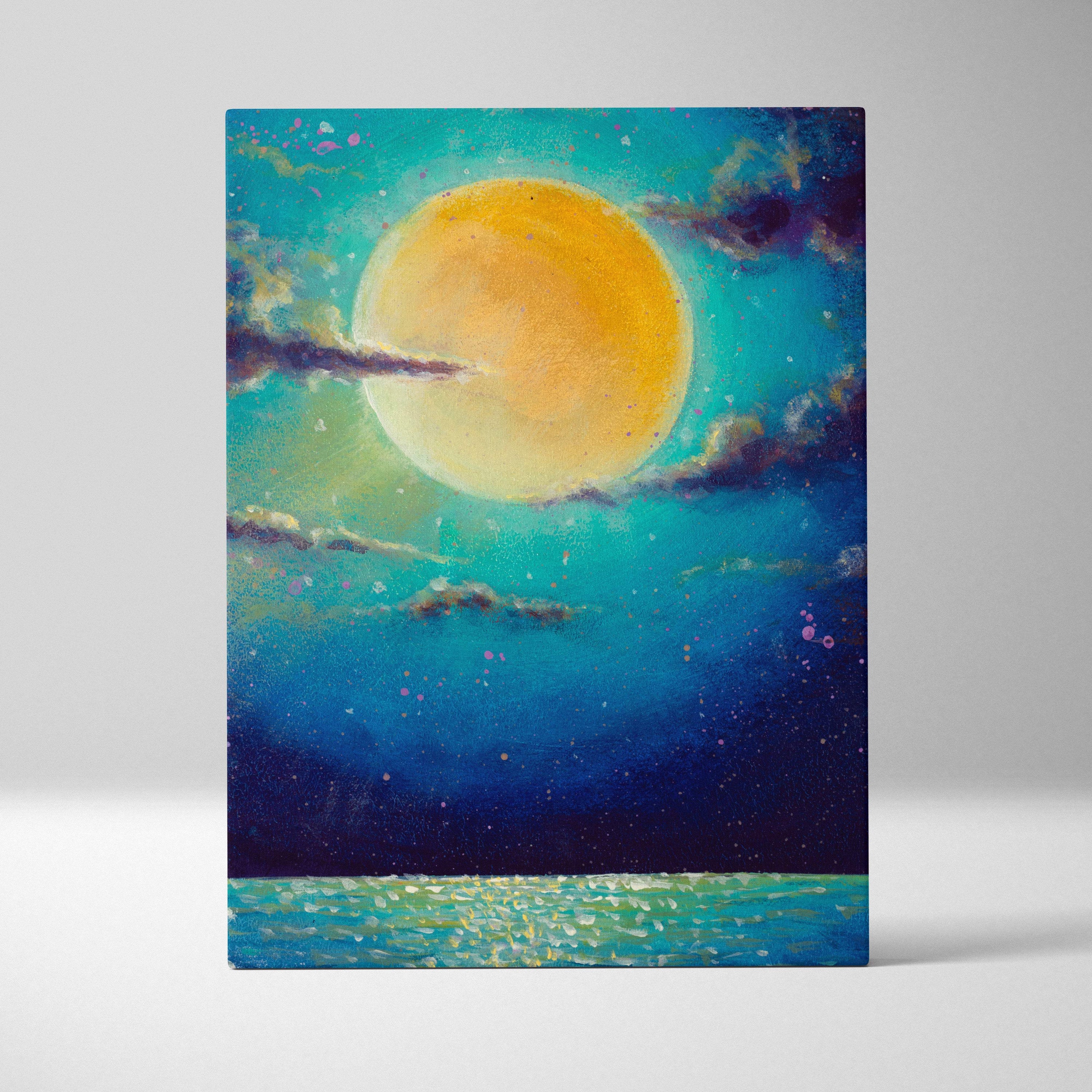 Vibrant acrylic canvas wall art featuring a glowing golden moon over a teal and deep blue starry coastal landscape