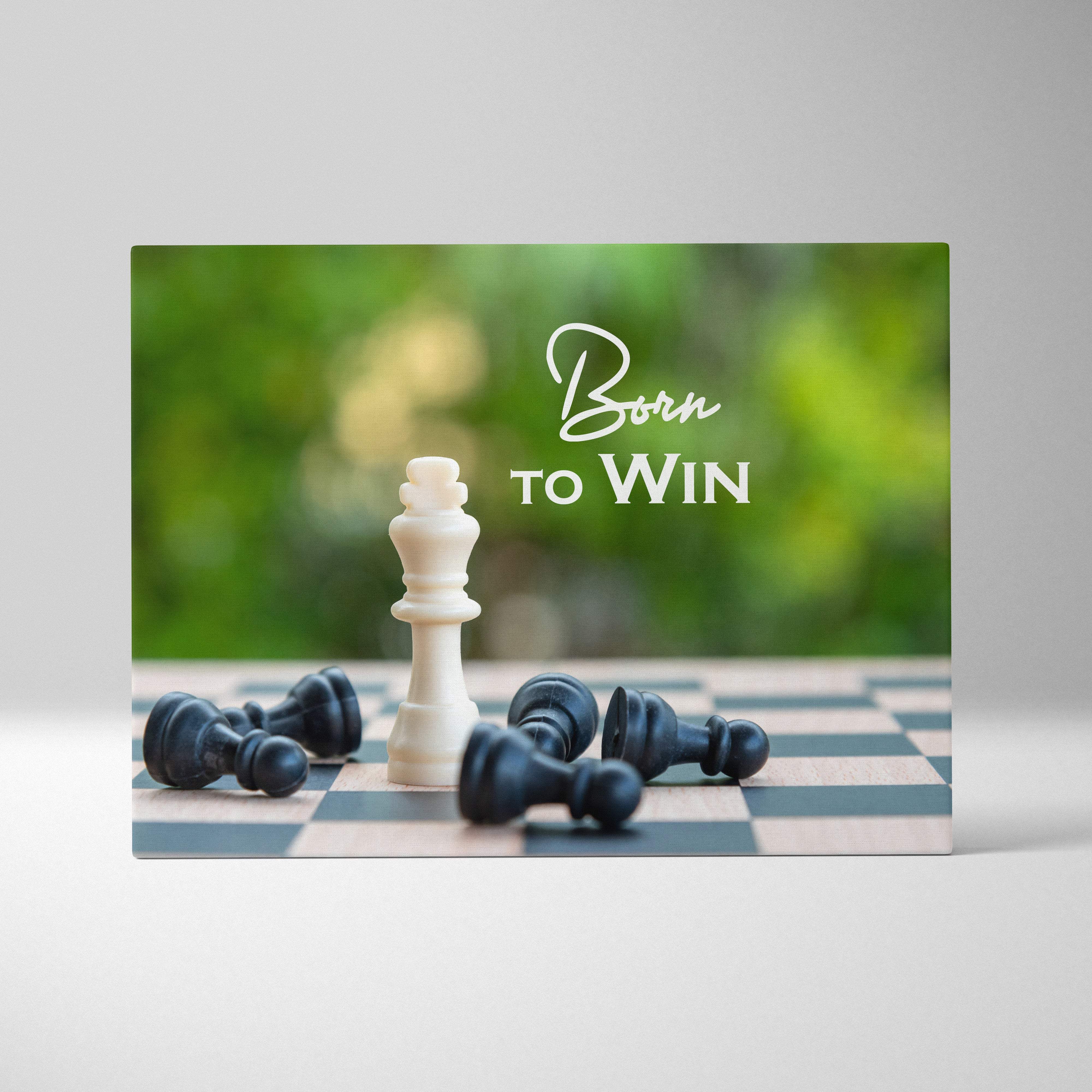 Motivational born to win canvas wall art featuring a white chess king on a checkered board with fallen black pieces