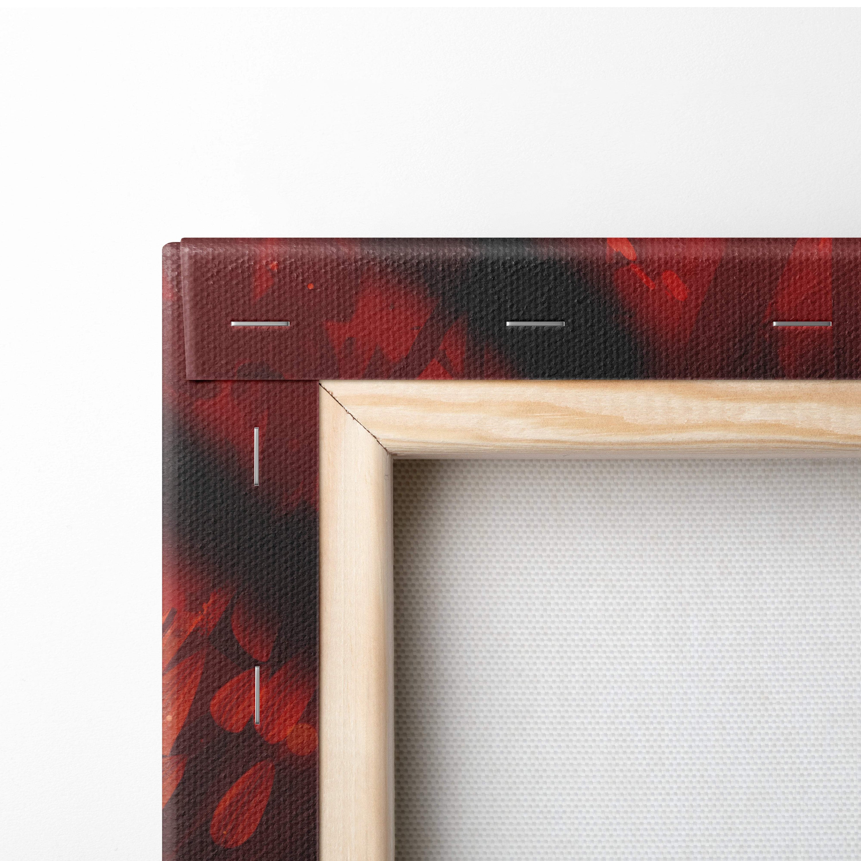 A wooden frame with red and black abstract canvas featuring visible stitching from autumn spirit dragon art print