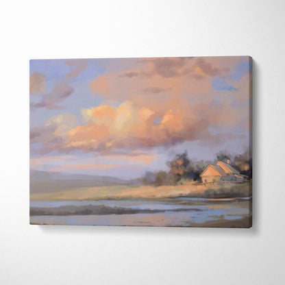 Soft pastel countryside landscape canvas print with warm orange and pink clouds above a calm rural home by water at sunset