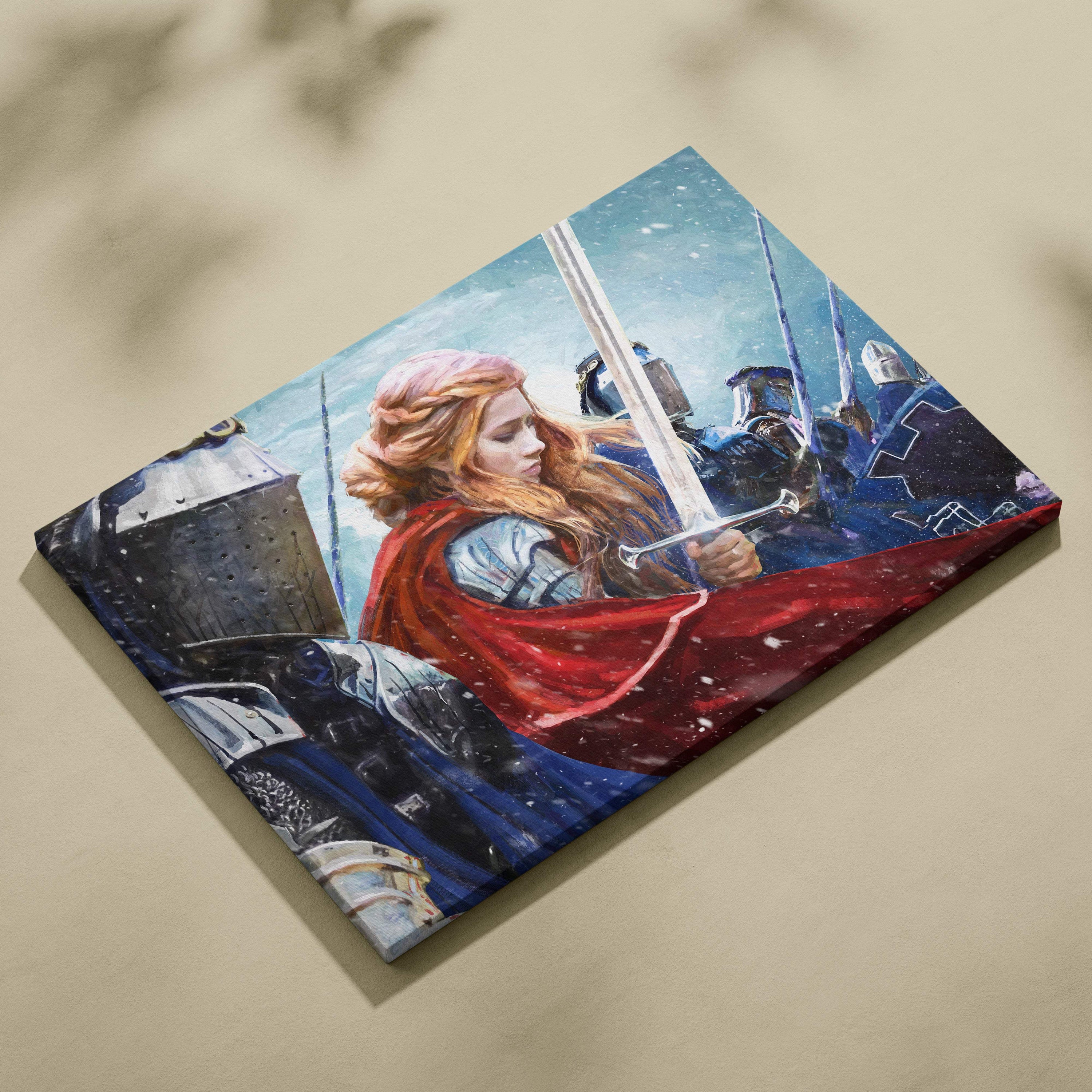 Canvas print of a red-cloaked female warrior in armor holding a sword leading knights through a snowy battle