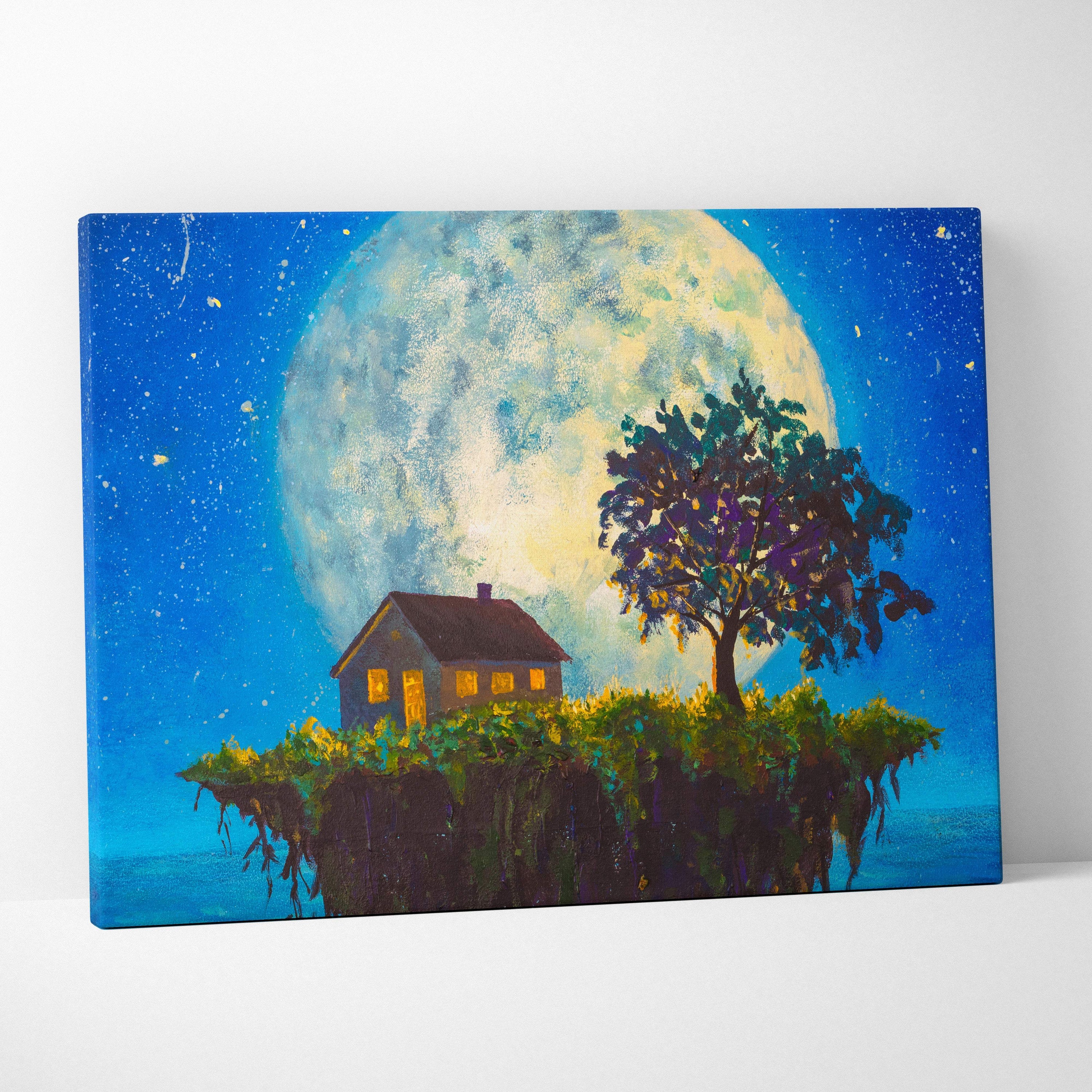 A canvas print of a cozy cottage with warm yellow lights under a giant full moon in a deep blue starry sky