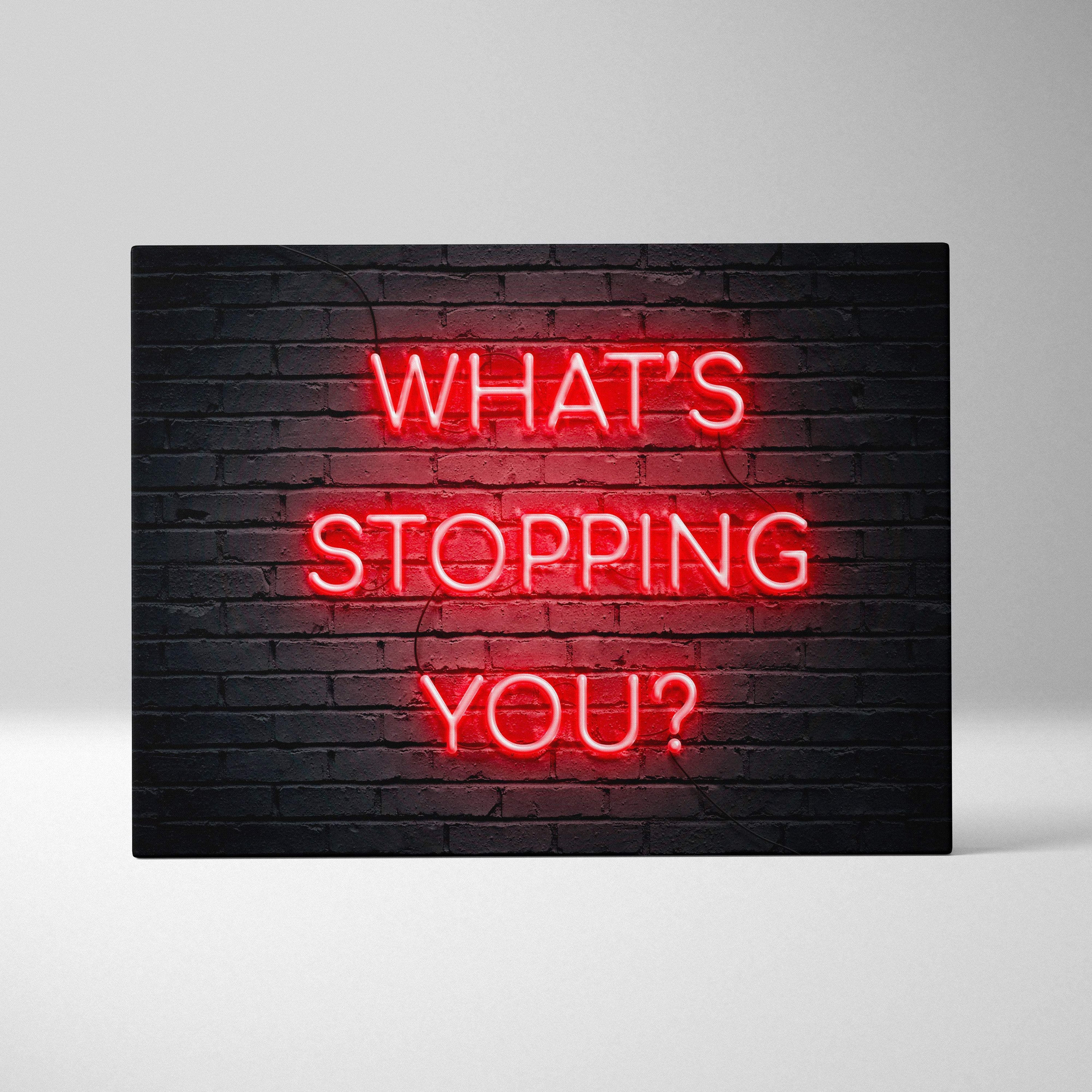 Red neon what’s stopping you wall art print with motivational quote on black brick wall for office gym or bedroom decor