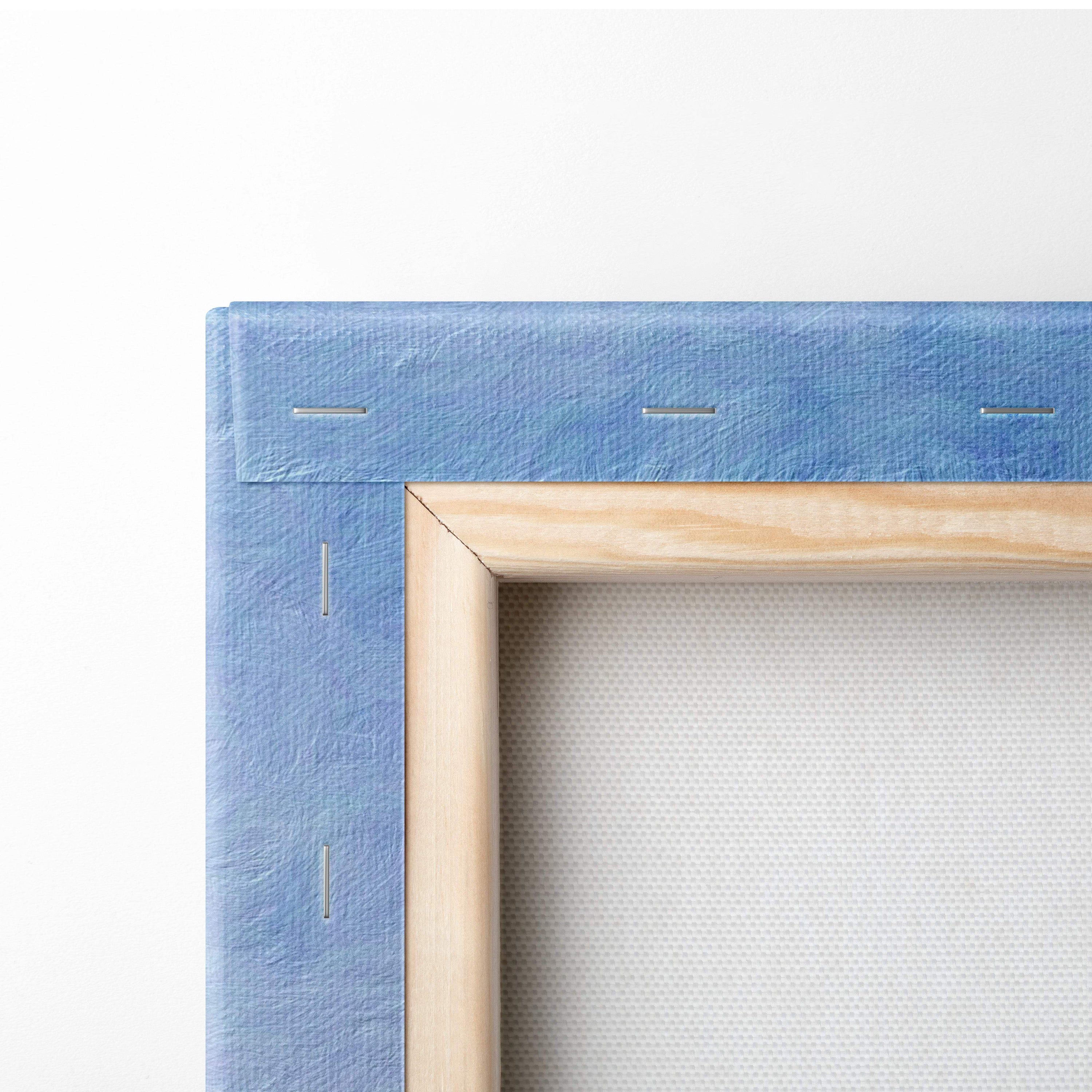 Light blue textured canvas with visible stitching and natural wood frame of tropical pink sunset beach wall art