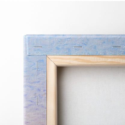 Light blue textured canvas wall art with visible stitching and natural wood frame for serene mountain landscape print