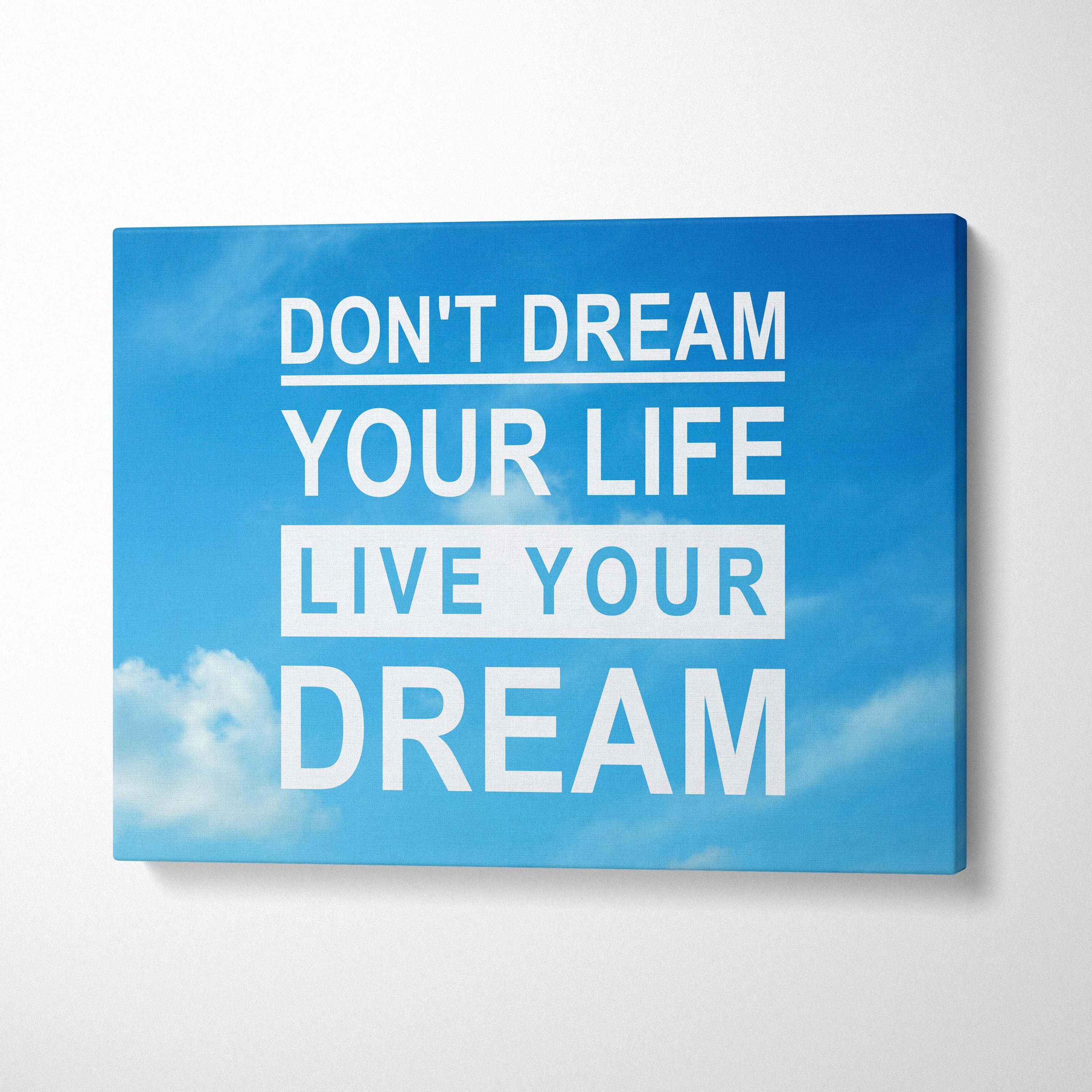 Blue canvas wall art print with bold white inspirational typography live your dream quote sky background decor