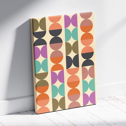Rectangular canvas wall art with vibrant geometric overlapping circles in orange purple teal olive green and black on off-white