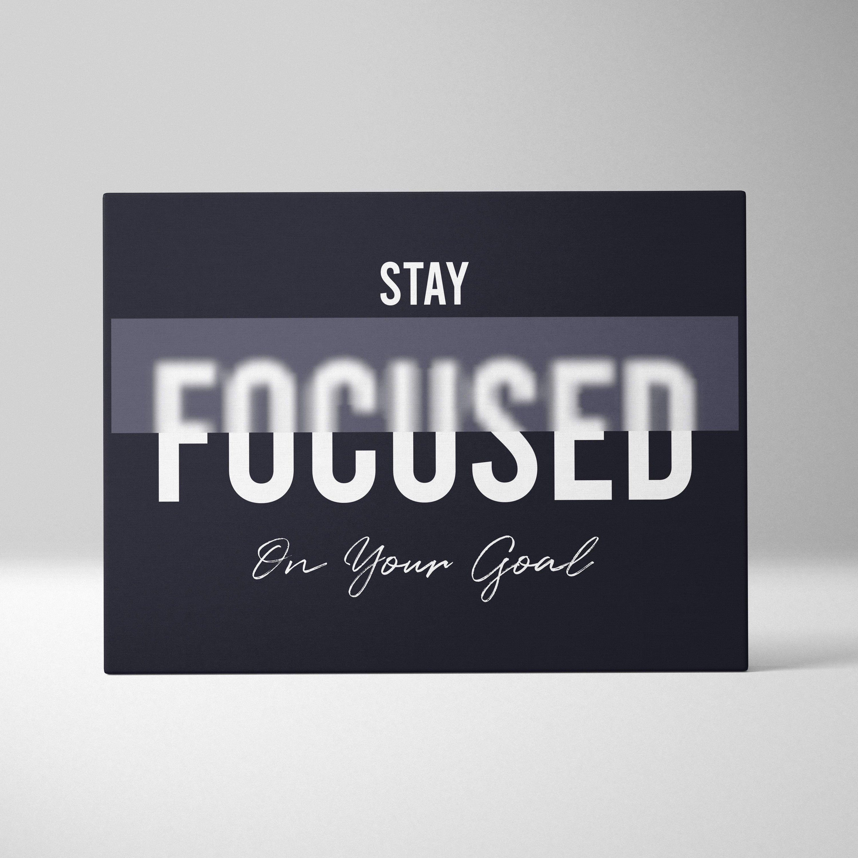 Black rectangular motivational wall art print with white stay focused on your goal text for office bedroom or gym decor