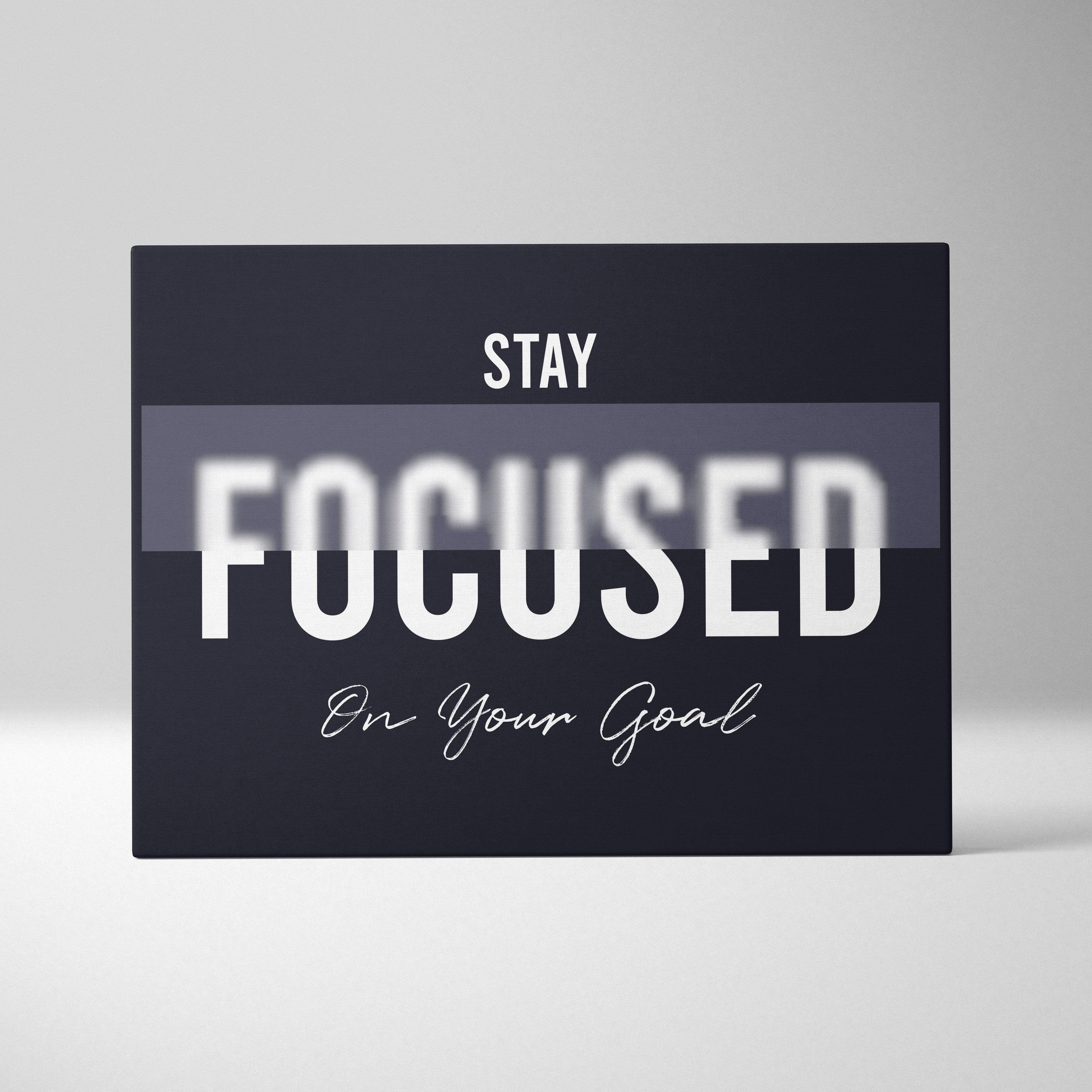 Black rectangular motivational wall art print with white stay focused on your goal text for office bedroom or gym decor
