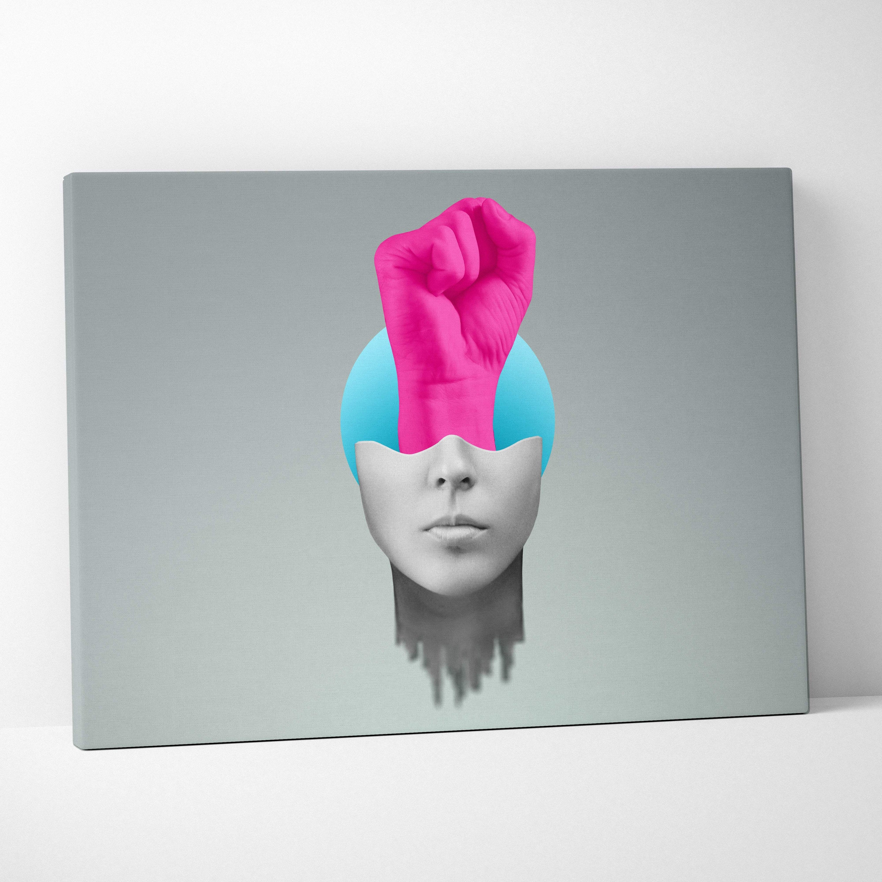 Contemporary pink fist canvas wall art featuring a vibrant pink fist emerging from a cyan sphere on grayscale face