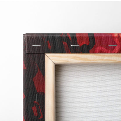 Dark surreal shadow figure canvas art with bold red and black abstract pattern framed by light wood border