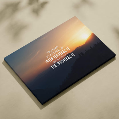 Rectangular canvas print of a sunset over mountains with white inspirational text for office or home decor