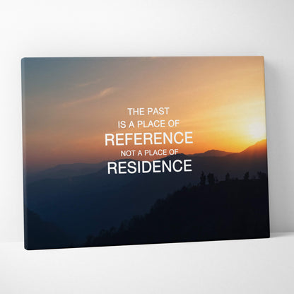 Rectangular canvas print of a mountain sunset with warm orange and blue gradients and motivational white text for home or office decor