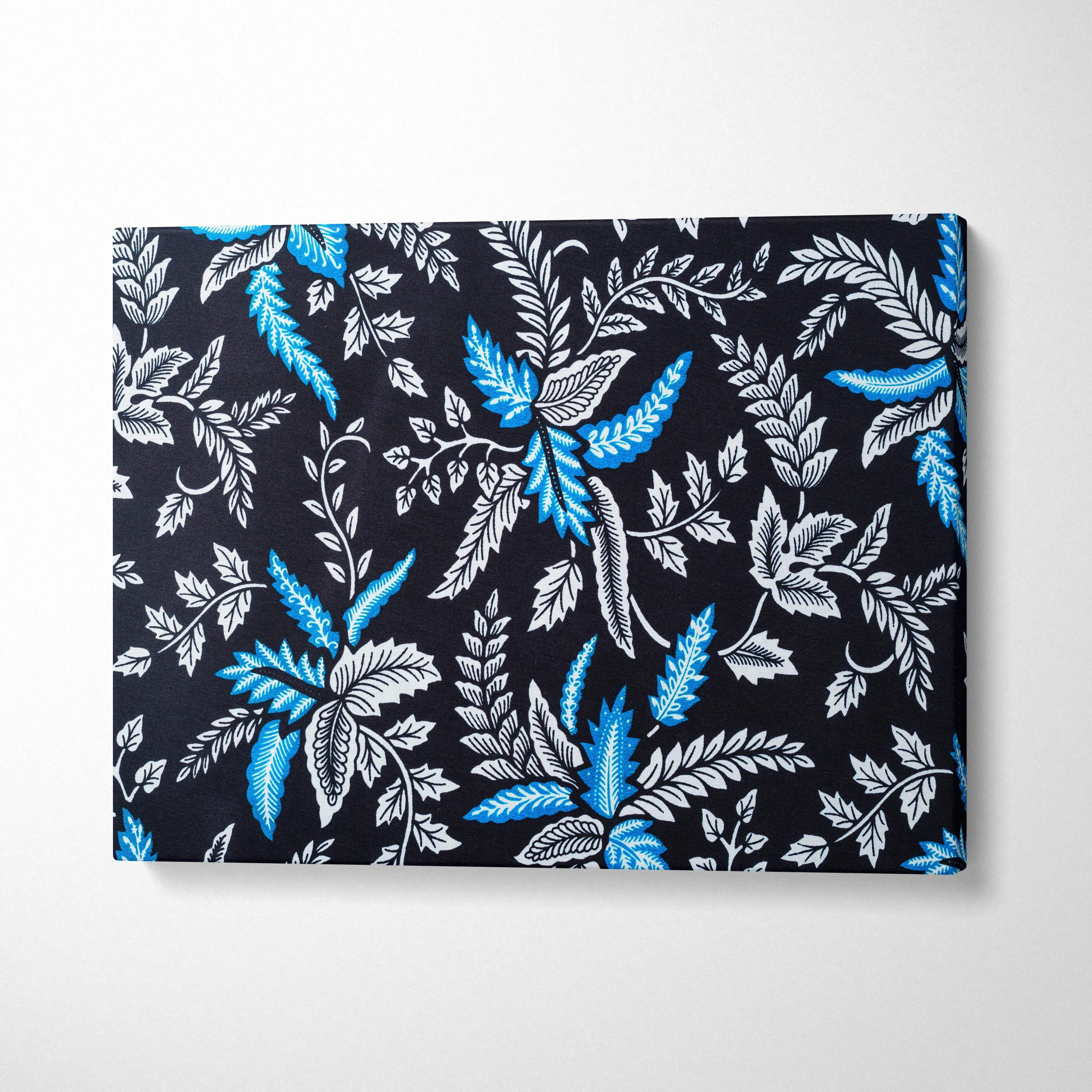 Elegant black canvas wall art with blue white botanical leaves
