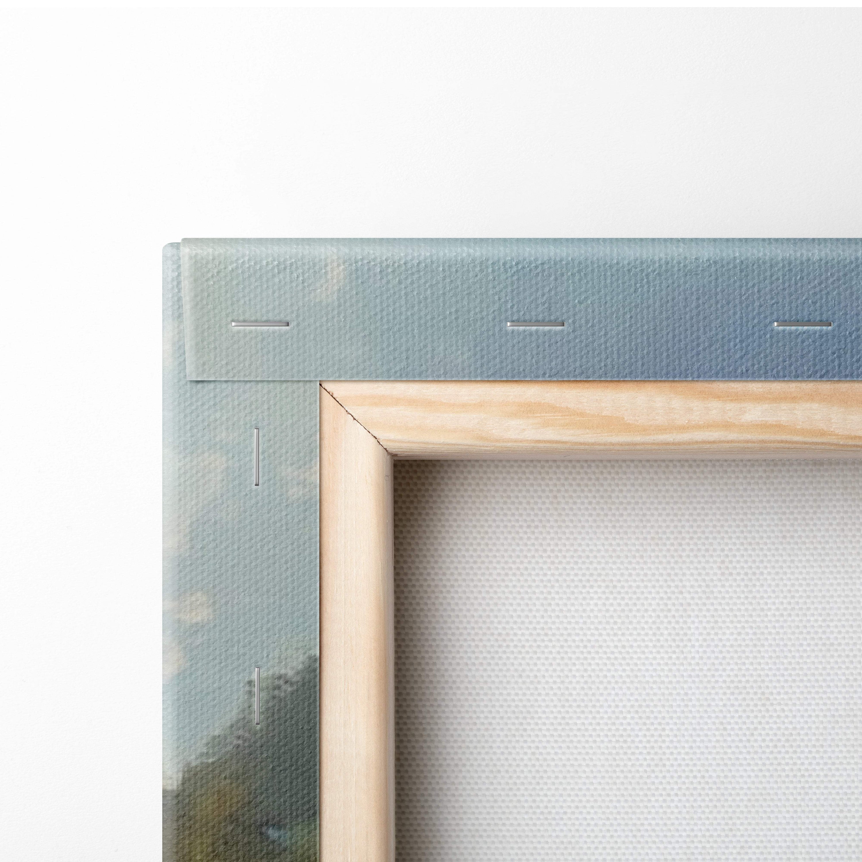 Light wood-framed serene mountain river landscape canvas print with soft blue-green border and stitched details