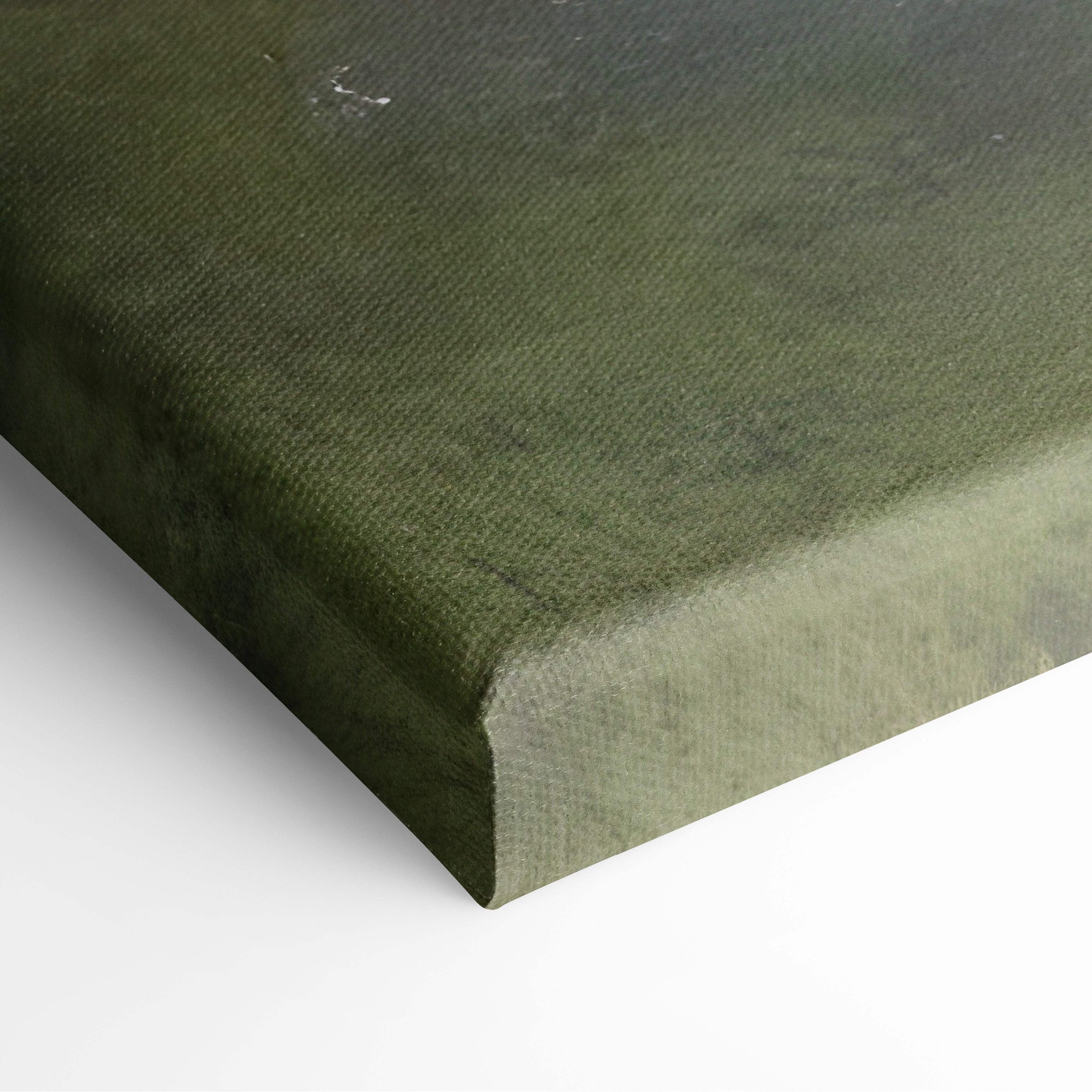 Olive green canvas print with textured woven surface featuring soft misty meadow landscape and gentle stream design