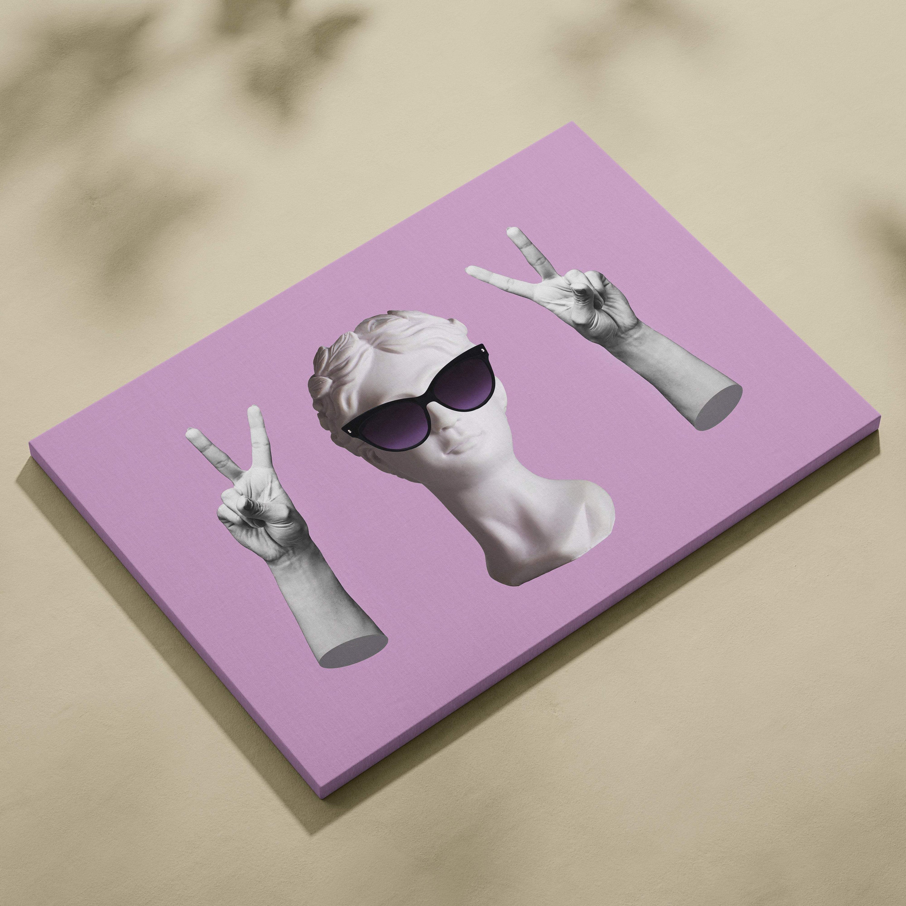A lavender canvas print of a white marble-style bust wearing black sunglasses making peace signs for modern decor